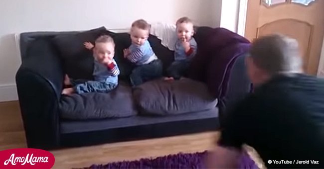 Triplets have sweetest reaction as soon as their father enters the room