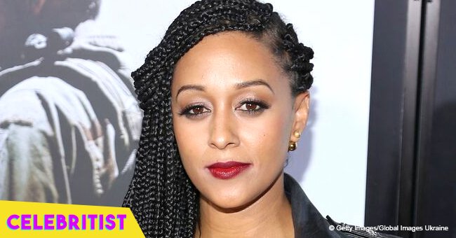 Tia Mowry shares photo of baby daughter Cairo with little hair, posing in striped bib