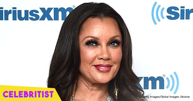 Vanessa Williams shows off her figure in black plunging dress