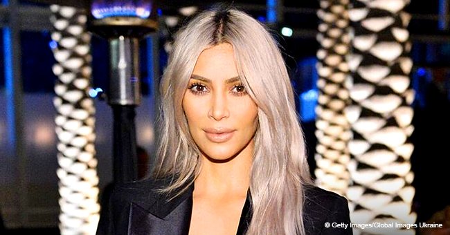 Kim Kardashian turns up the heat in bust-baring dress with thigh-high slit, risking a nip slip