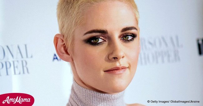 Kristen Stewart and her female partner wear matching outfits as they enjoy a romantic night out