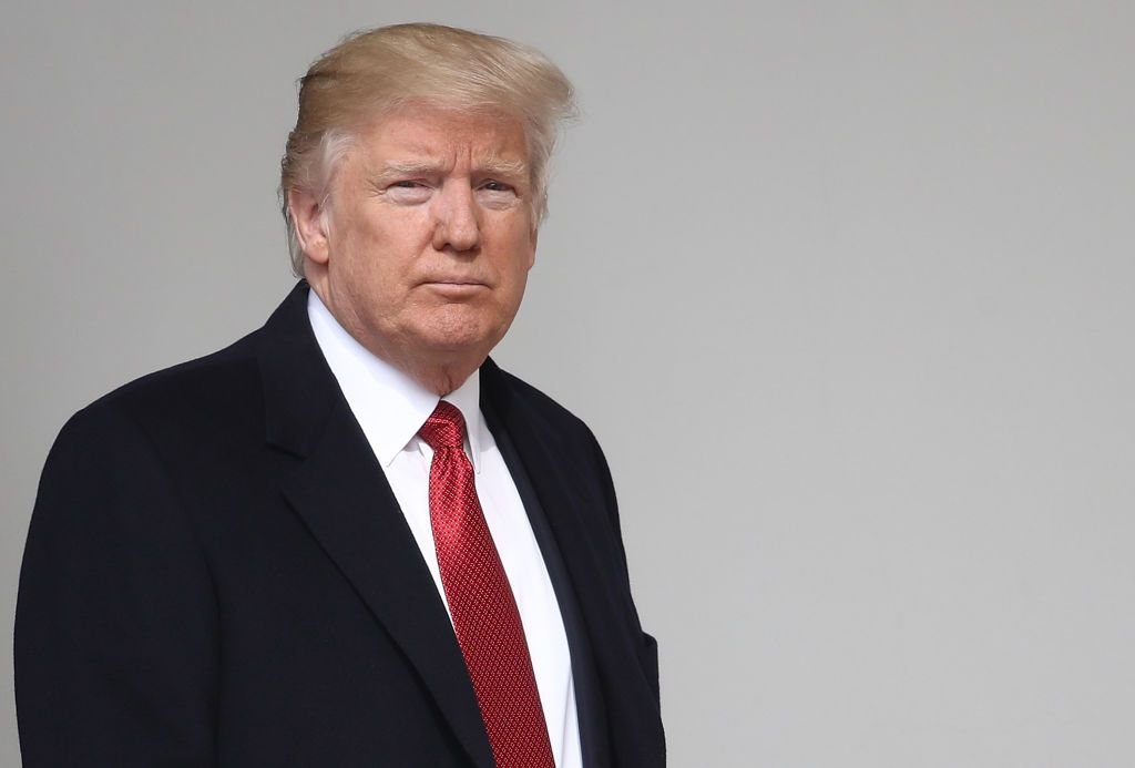 Donald Trump walking to a waiting Marine One helicopter while departing the White House in Washington, D.C. | Photo: Win McNamee/Getty Images