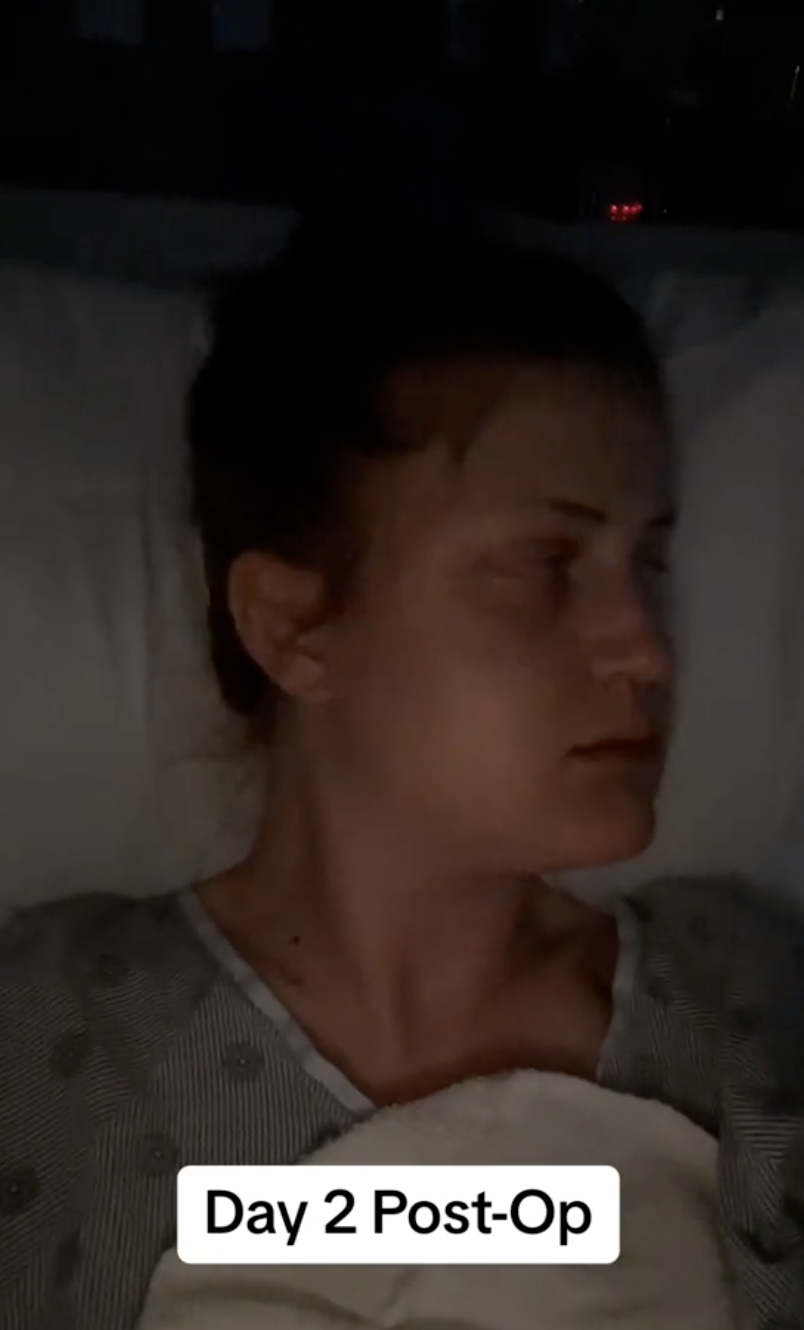 In another angle, Virginia Elder appears reflective while recovering in bed on Day 2 post-op. | Source: TikTok/virginiaeelder