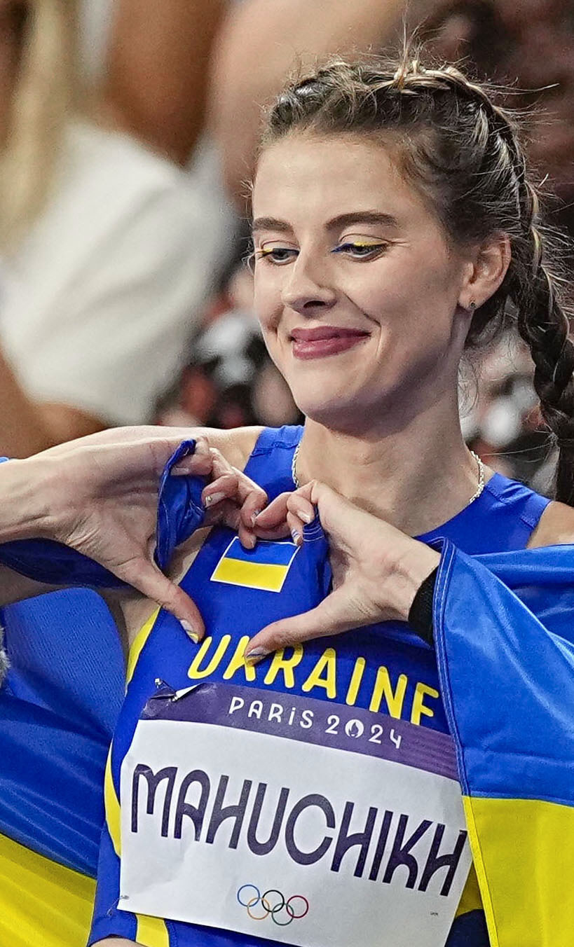 Yaroslava Mahuchikh poses after winning gold in the women's high jump at the Paris Olympics on August 4, 2024, in Paris, France. | Source: Getty Images