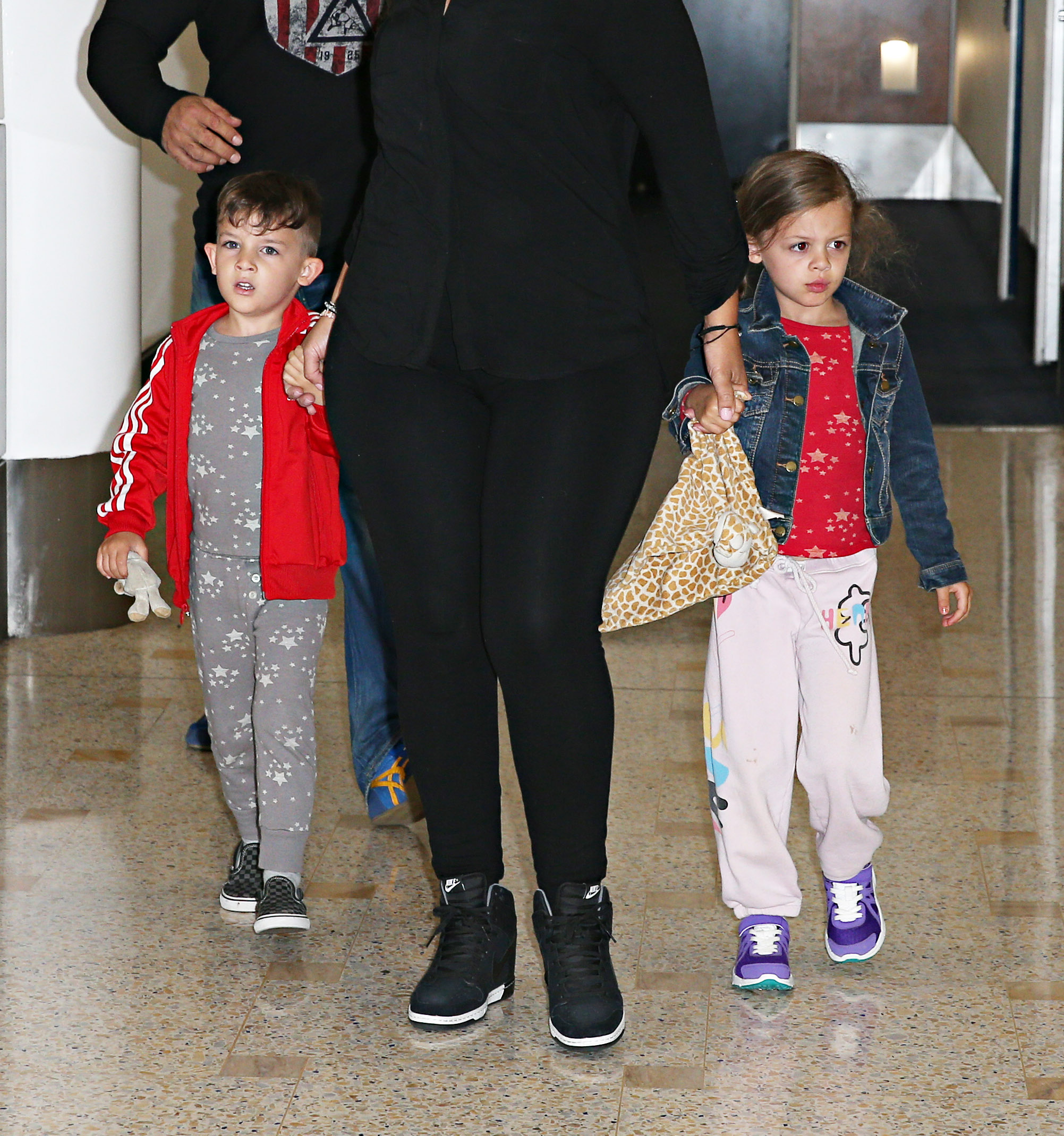 Nicole Richie's children Sparrow Madden (L) and Harlow Madden (R) are seen upon arrival at Sydney International Airport on June 24, 2014 in Sydney, Australia | Source: Getty Images