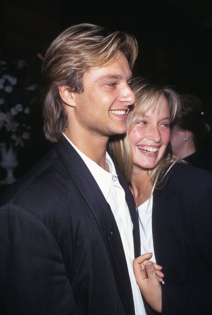 David Hallyday and Estelle Lefébure at a party at Fouquet's in Paris on October 24, 1989, France. | Photo : Getty Images