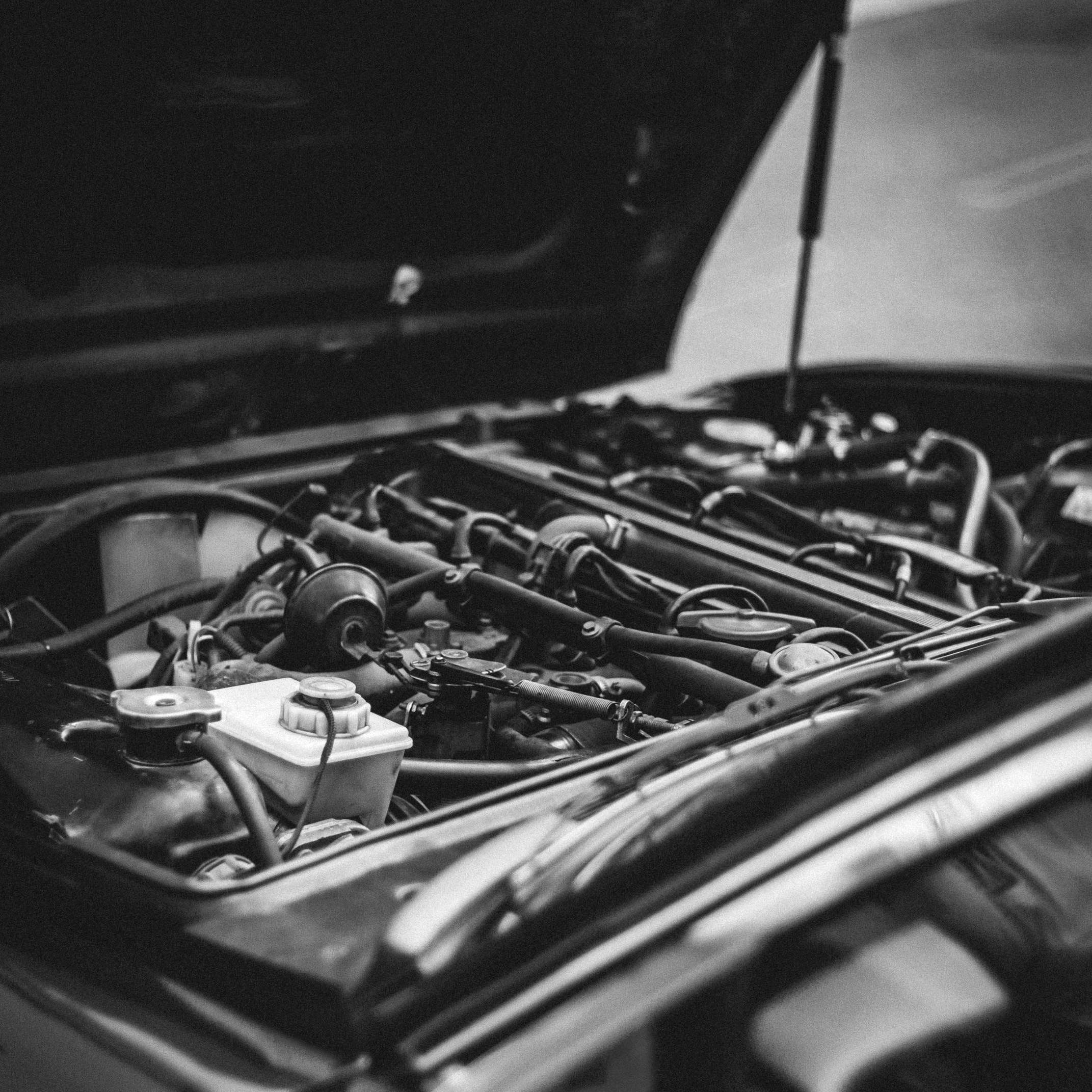 A hood-up view of a car engine | Source: Pexels