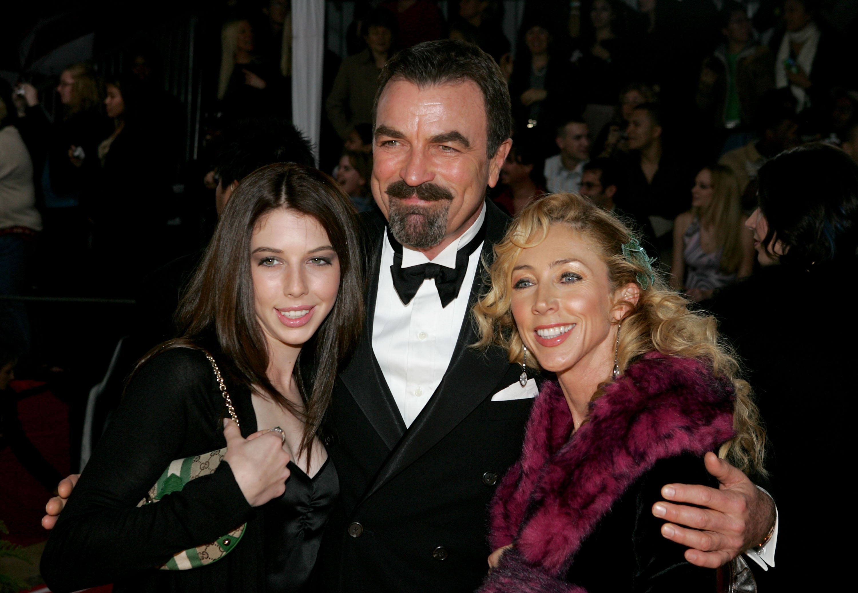 An undated image of Tom Selleck, daughter Hannah and wife Jillie Mack arriving at the 31st Annual People's Choice Awards | Photo