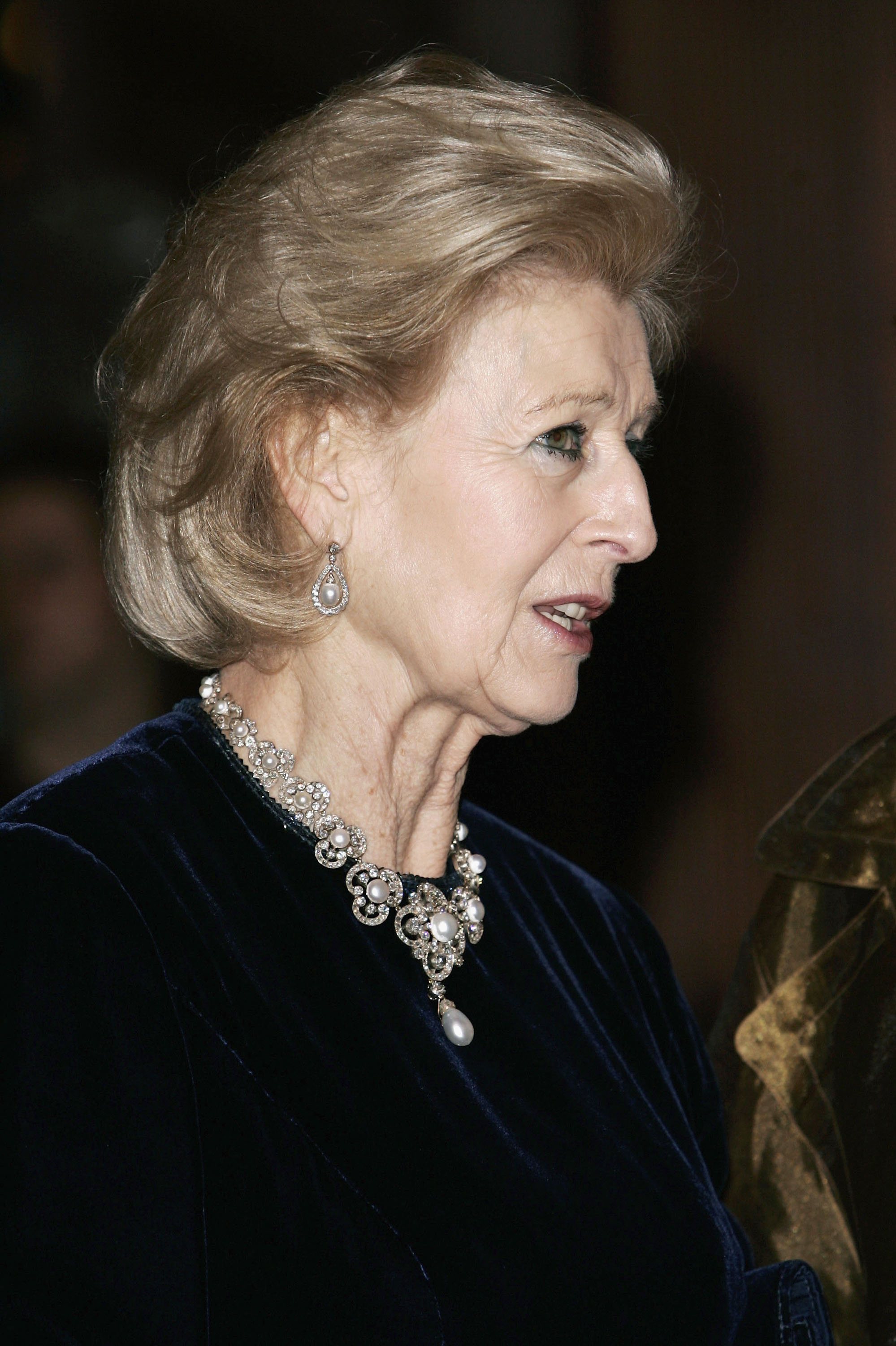 In a touching tribute to her late husband, Sir Angus Ogilvy, Princess Alexandra attends a Royal Gala performance of "Madame Butterfly" in London on 16 December 2005. Clad in dark velvet and pearls, she brings a quiet dignity to a night of remembrance and reverence.