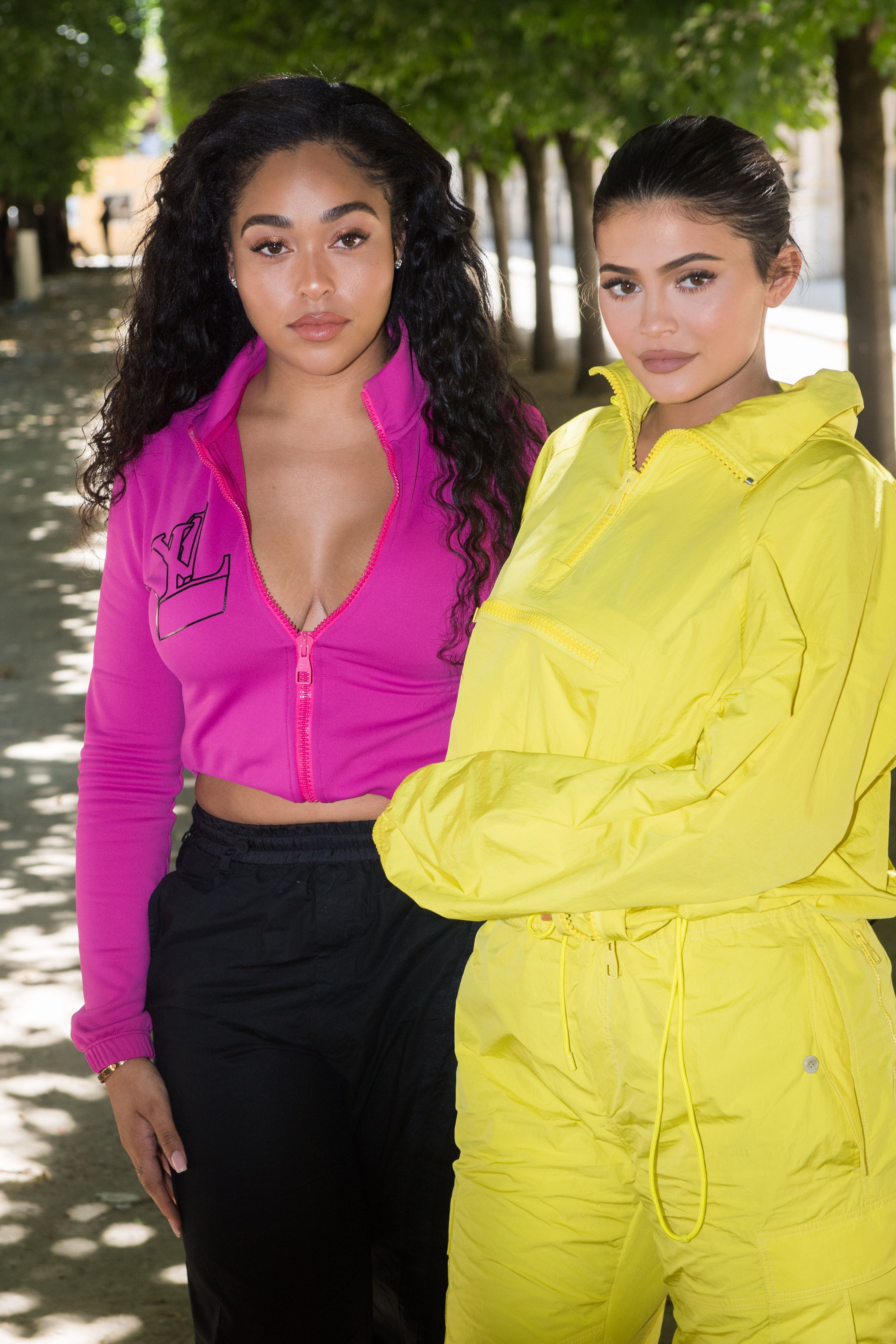 Jordyn Woods and Kylie Jenner at the Louis Vuitton Menswear Spring/Summer show for Paris Fashion Week Week on June 21, 2018, in Paris, France | Photo: Stephane Cardinale - Corbis/Getty Images