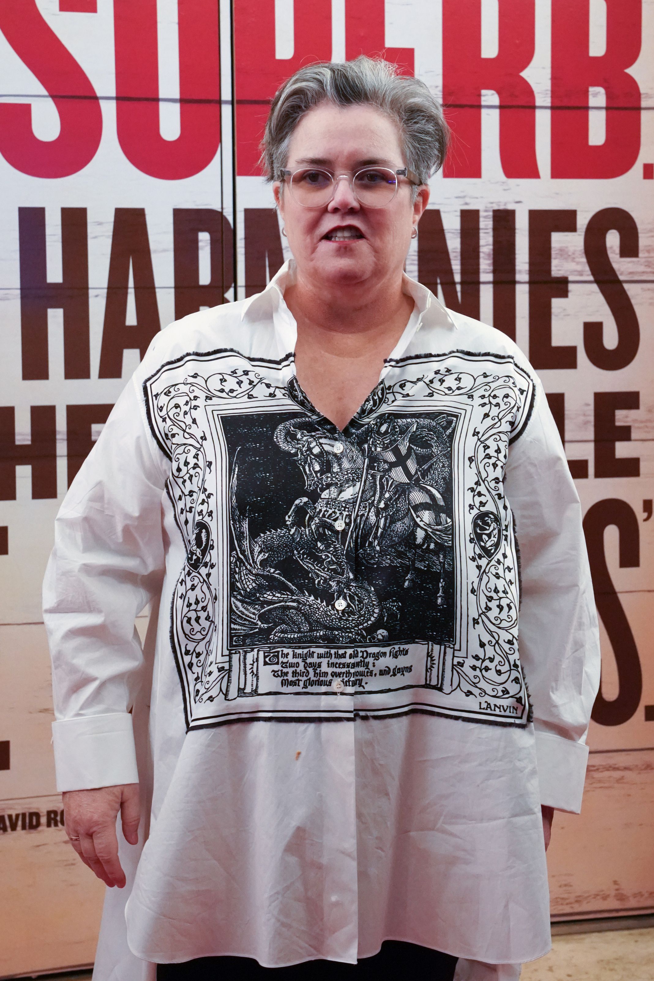 Attending the "Girl From the North Country" premiere on March 5, 2020, Rosie O'Donnell stepped out in a loose white shirt with bold black graphics, her gray hair slicked back and her expression calm and confident.