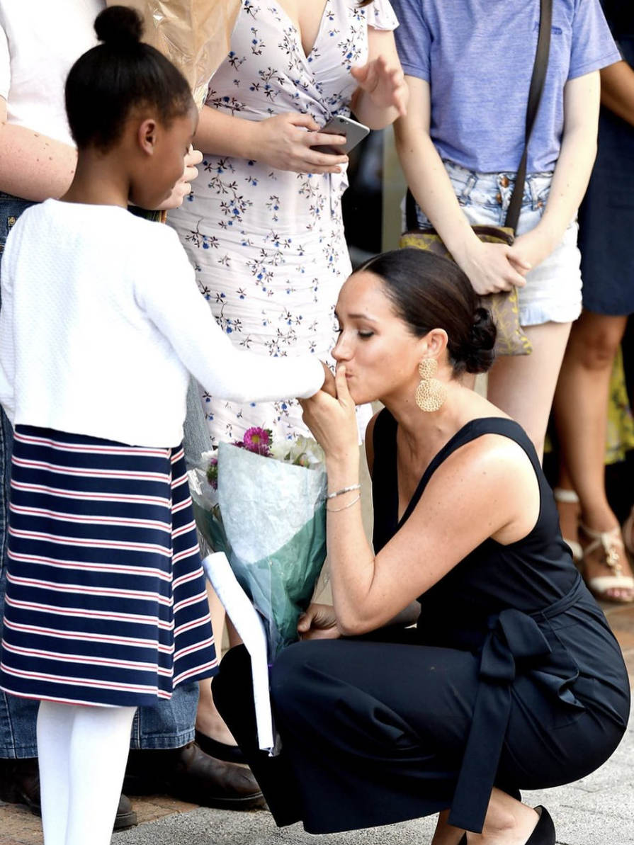 Meghan Markle with South African community members as seen in a September 26, 2019 Instagram post | Source: Instagram.com/sussexroyal/