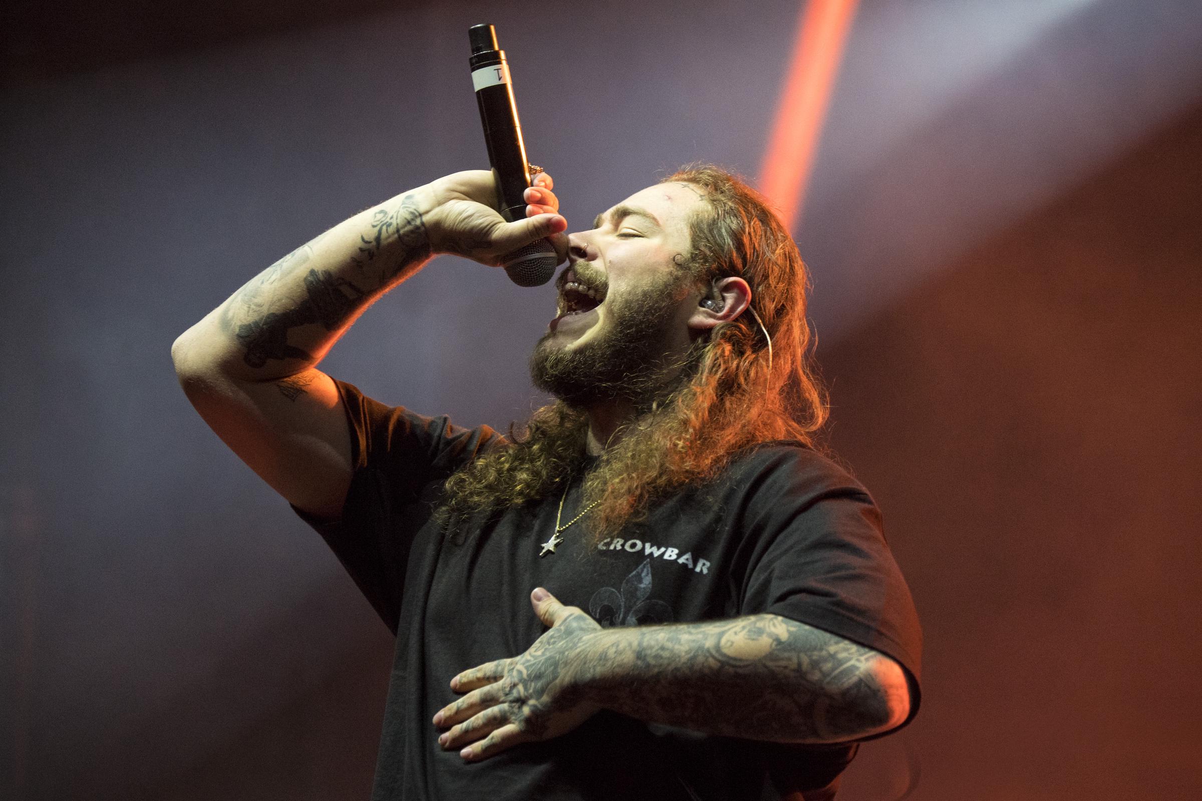 Post Malone performs at the Voodoo Music + Arts Experience in City Park, New Orleans, Louisiana, on October 29, 2017 | Source: Getty Images