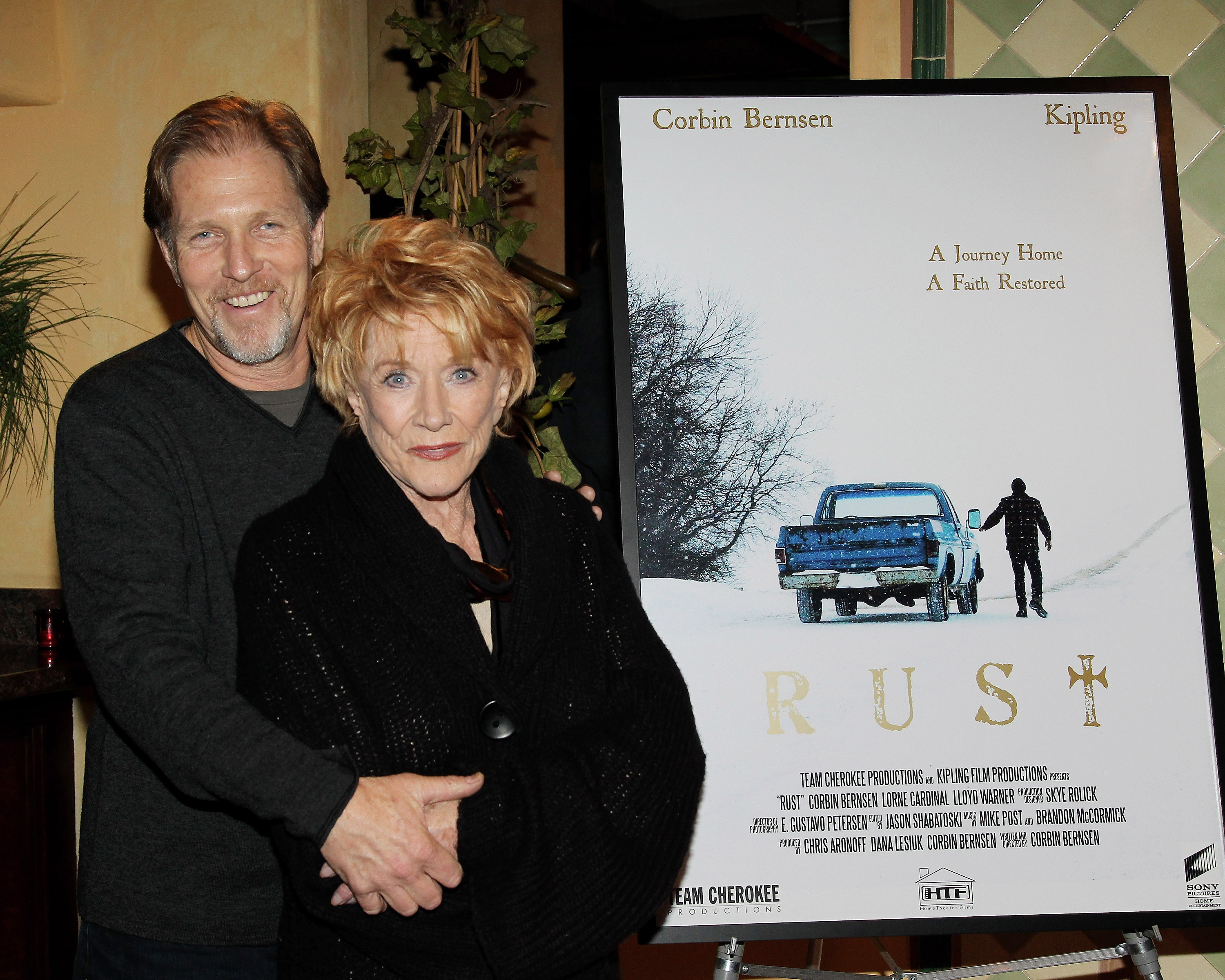 Collin Bernsen (L) posing with his mother, Jeanne Cooper, at the screening of "Rust" at Raleigh Studios on December 9, 2010 in Los Angeles, California | Source: Getty Images
