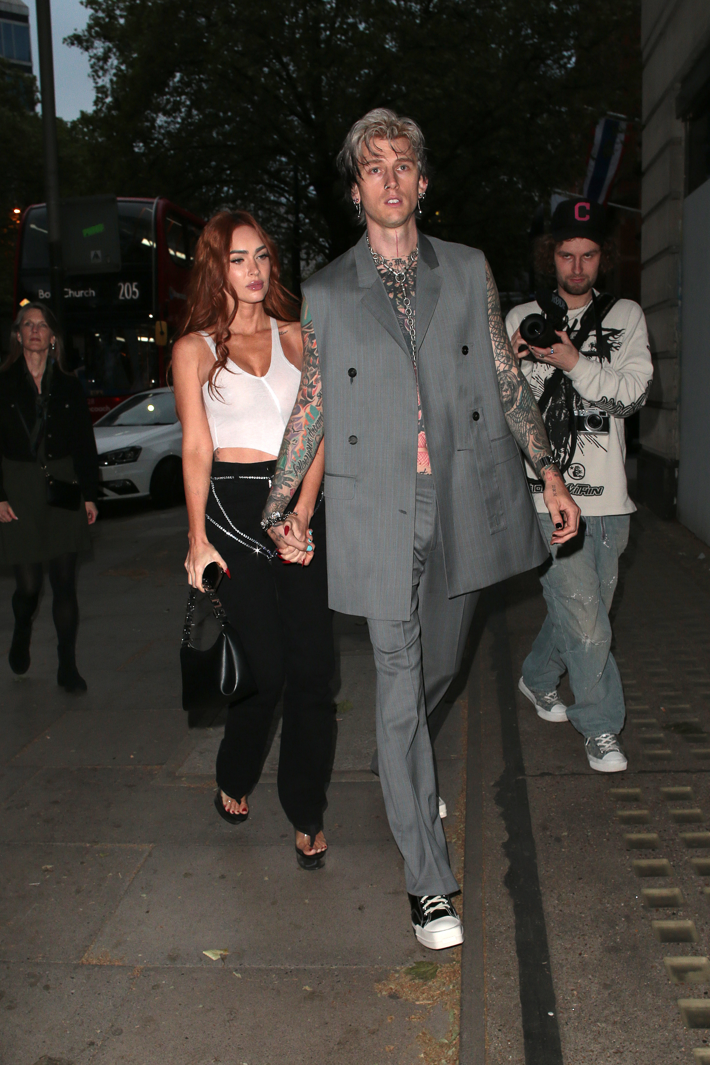Megan Fox and Machine Gun Kelly seen attending the unveiling of 'The 8th Deadly Sin - GOSSIP', a limited-edition ring collection by Stephen Webster x Machine Gun Kelly on May 30, 2023 in London, England | Source: Getty Images