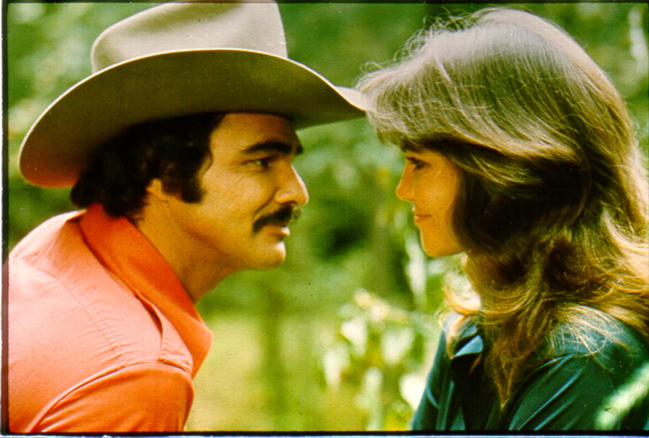 Actor Burt Reynolds as Bandit and Sally Field as Carrie in the comedy film "Smokey and the Bandit" on January 1, 1977 | Source: Getty Images