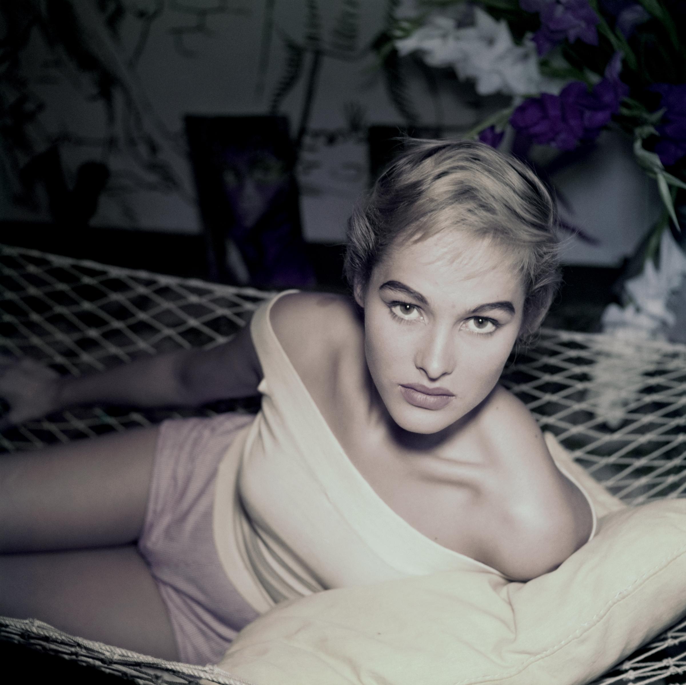 Ursula Andress poses in a hammock, in Rome, Italy, circa 1955. | Source: Getty Images