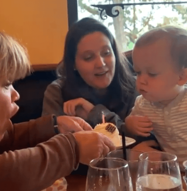Amy Roloff and her Grandson blow out the candle on her cake | Instagram: @amyjroloff