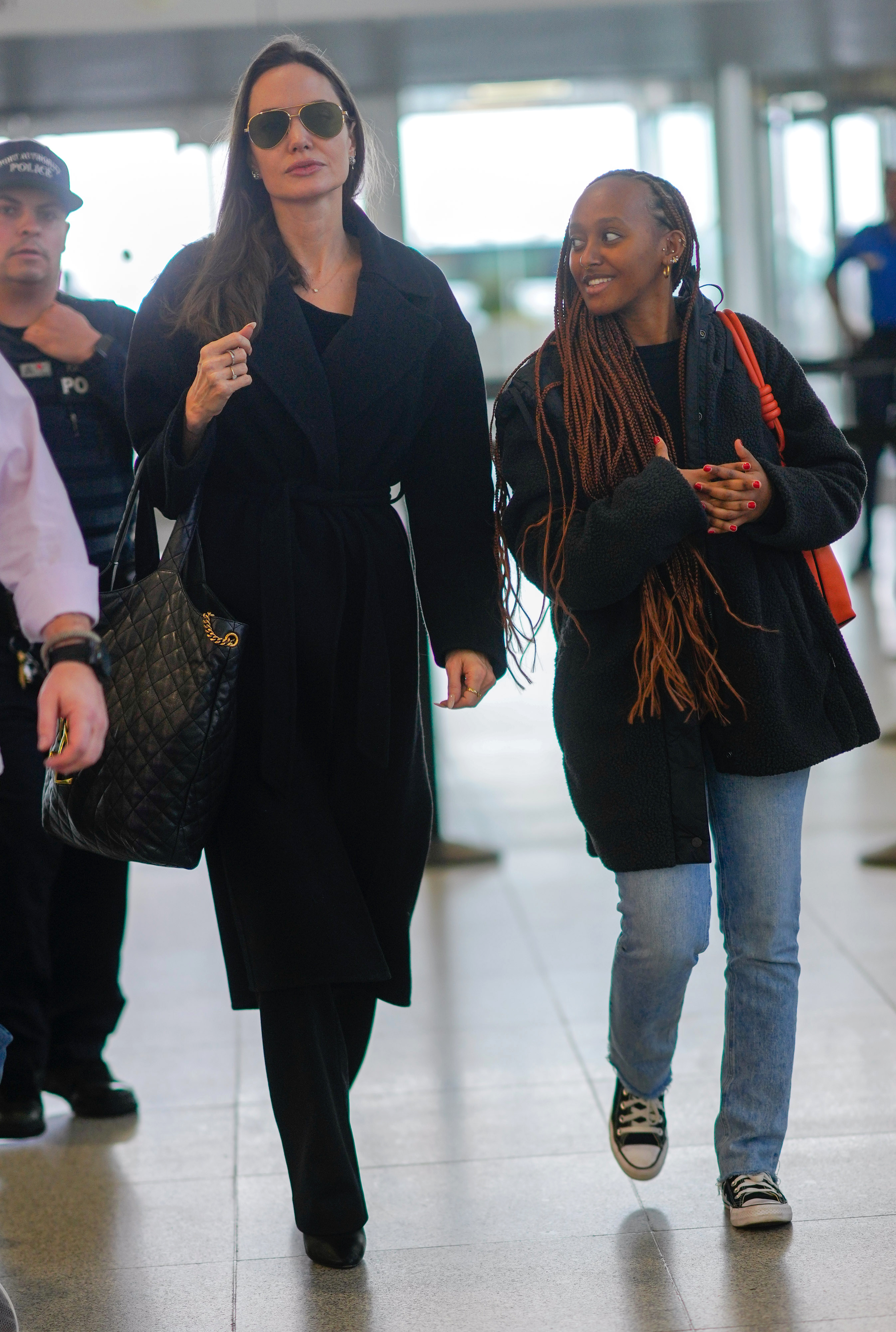 Angelina Jolie and Zahara Pitt-Jolie arrive at JFK Airport on January 13, 2023 in New York City. | Source: Getty Images