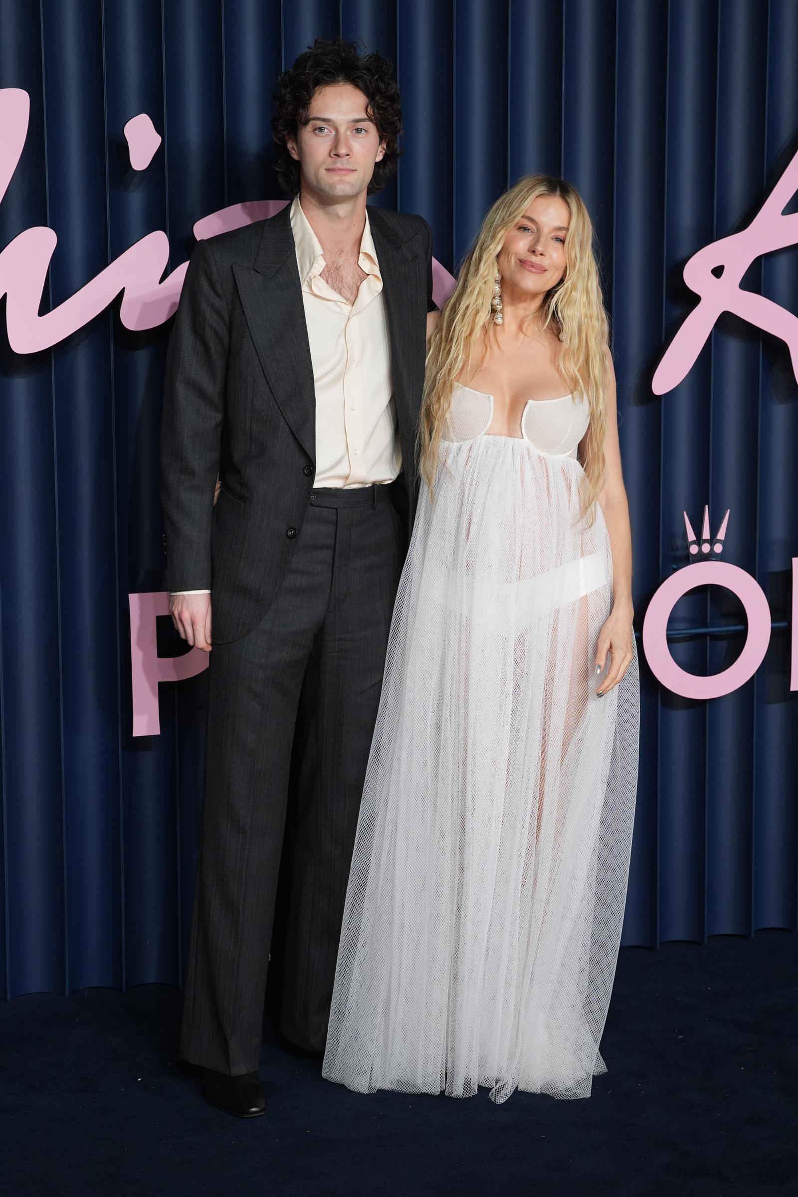 Sienna Miller and Oli Green attend The Fashion Awards 2025 presented by Pandora at the Royal Albert Hall on 1 December 2025 in London, England. | Source: Getty Images