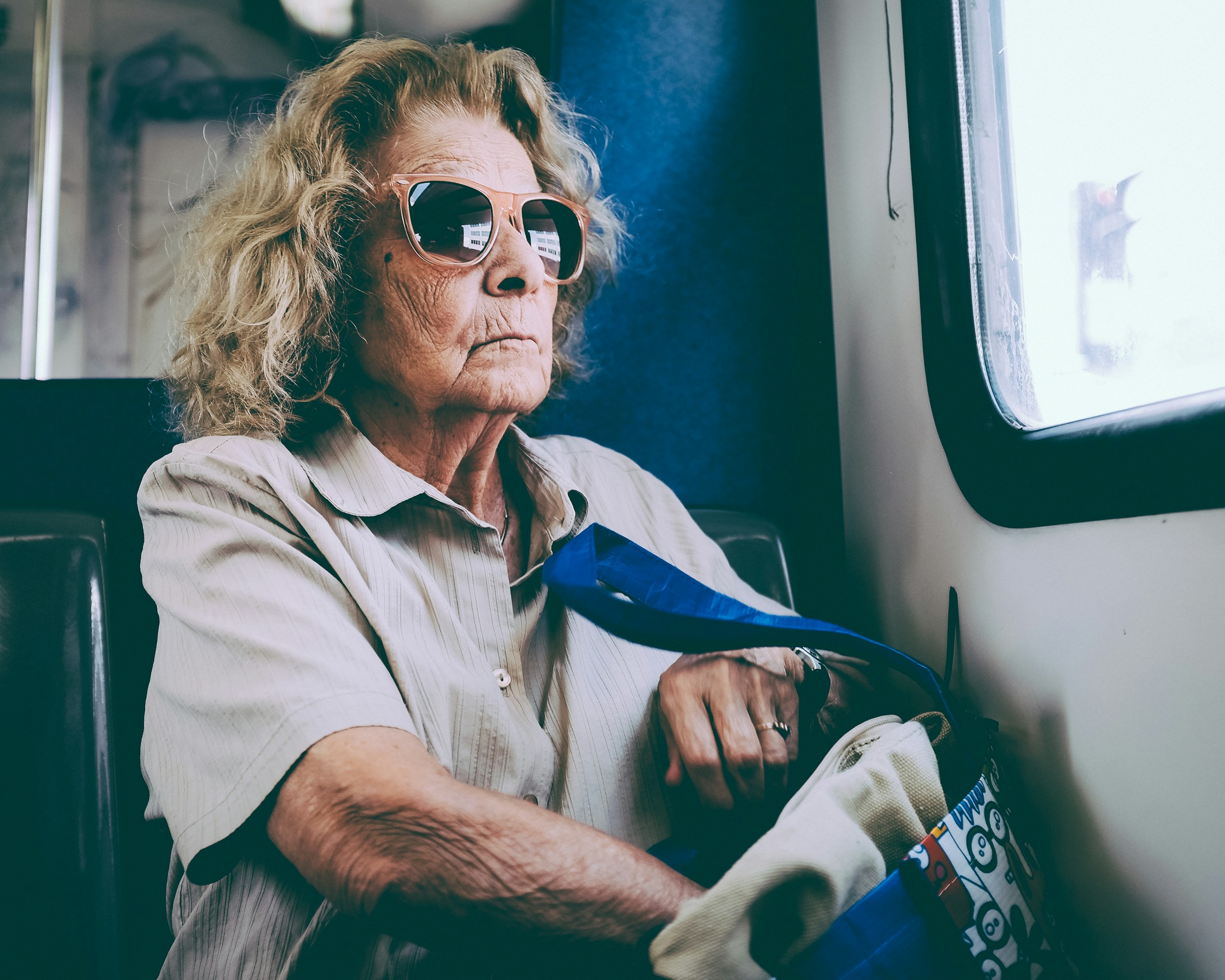 An older woman traveling in a bus | Source: Unsplash