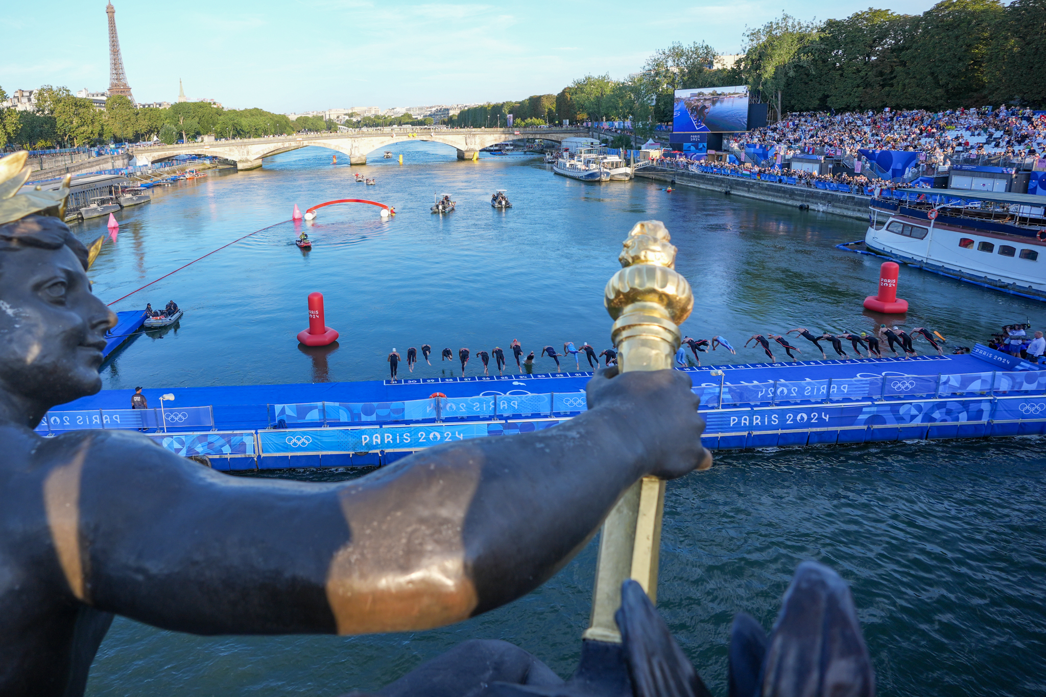 Athletes compete in the Marathon Swimming Men's 10km event at the Olympic Games in Paris, France, on August 9, 2024 | Source: Getty Images