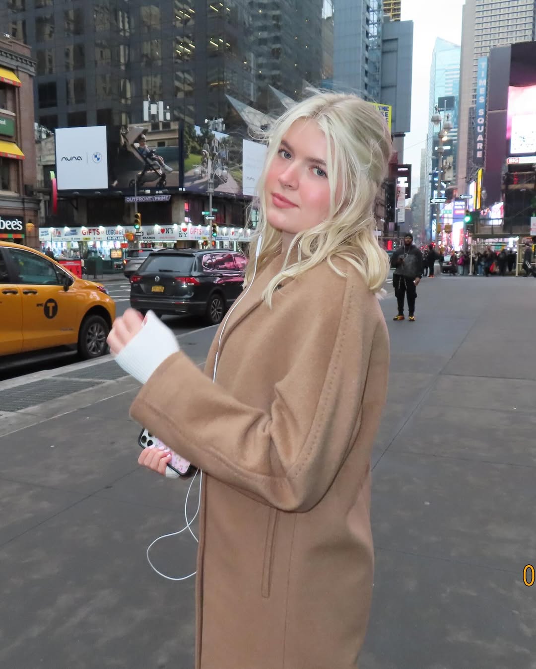 A photo of Lola Sheen standing on a street in New York City in February, dated March 1, 2025 | Source: Instagram/lola_sheen