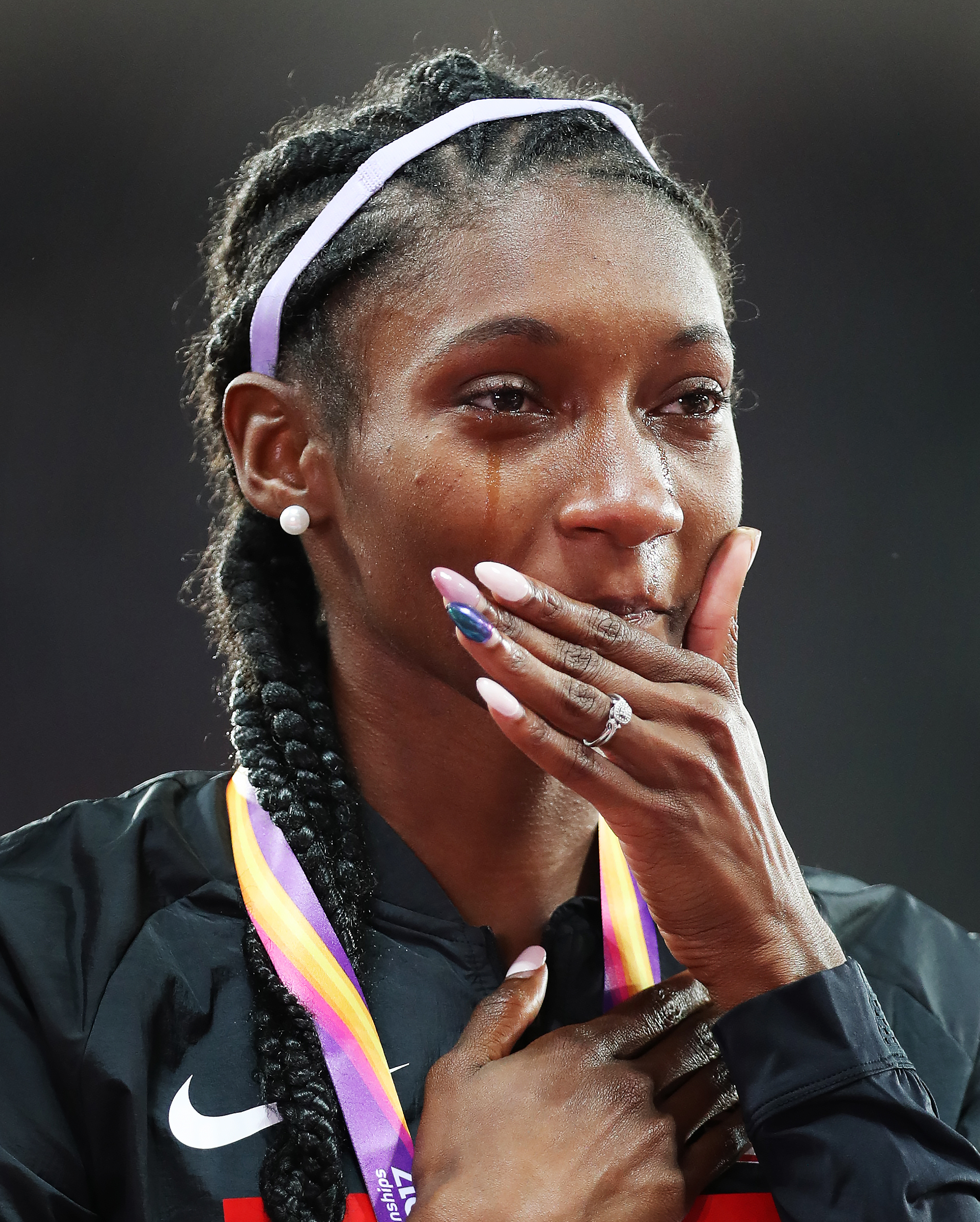Tori Bowie of United States is seen on the podium with her gold medal from the Women's 4100m Relay final during day ten of the 16th IAAF World Athletics Championships London 2017 at The London Stadium on August 13, 2017 in London, United Kingdom. | Source: Getty Images