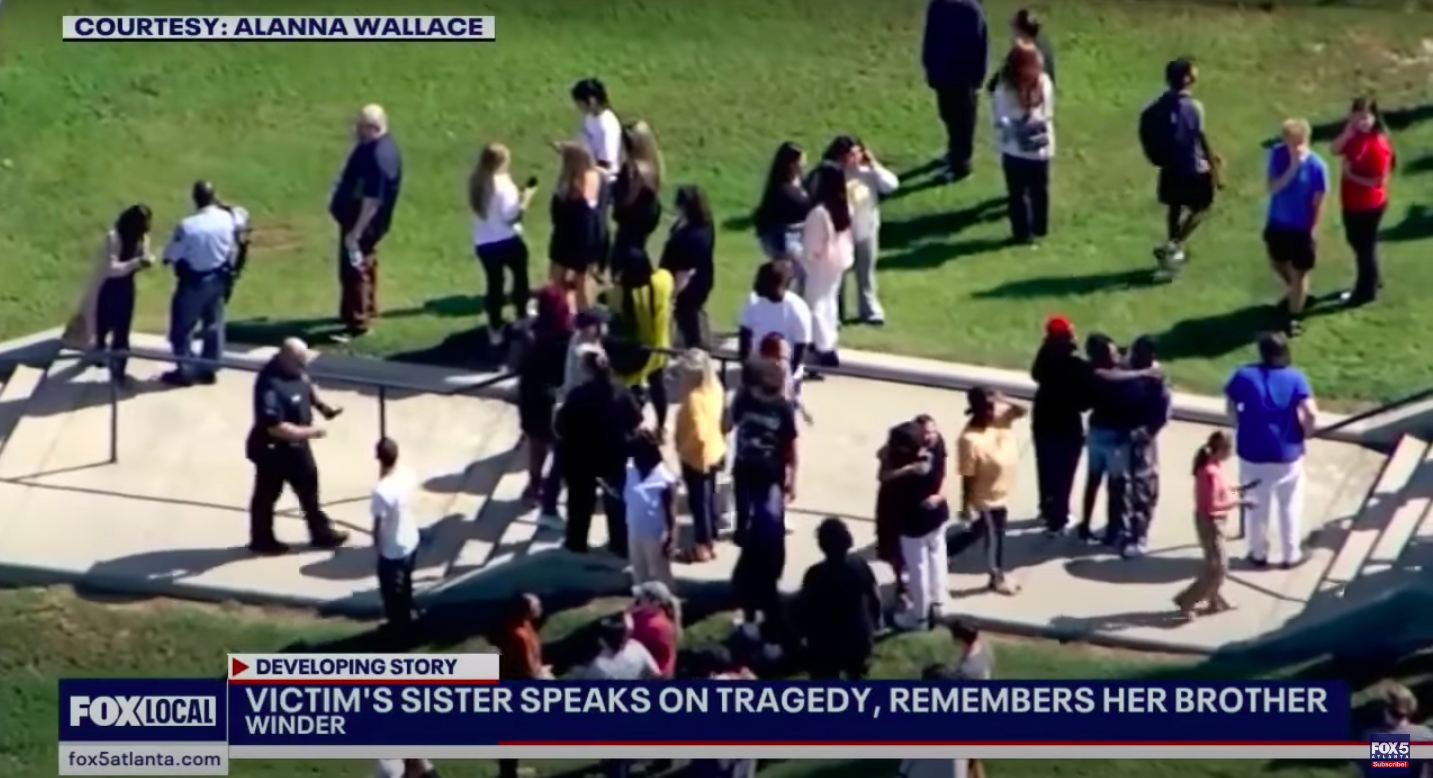 People waiting outside Apalachee High School. | Source: YouTube/FOX 5 Atlanta