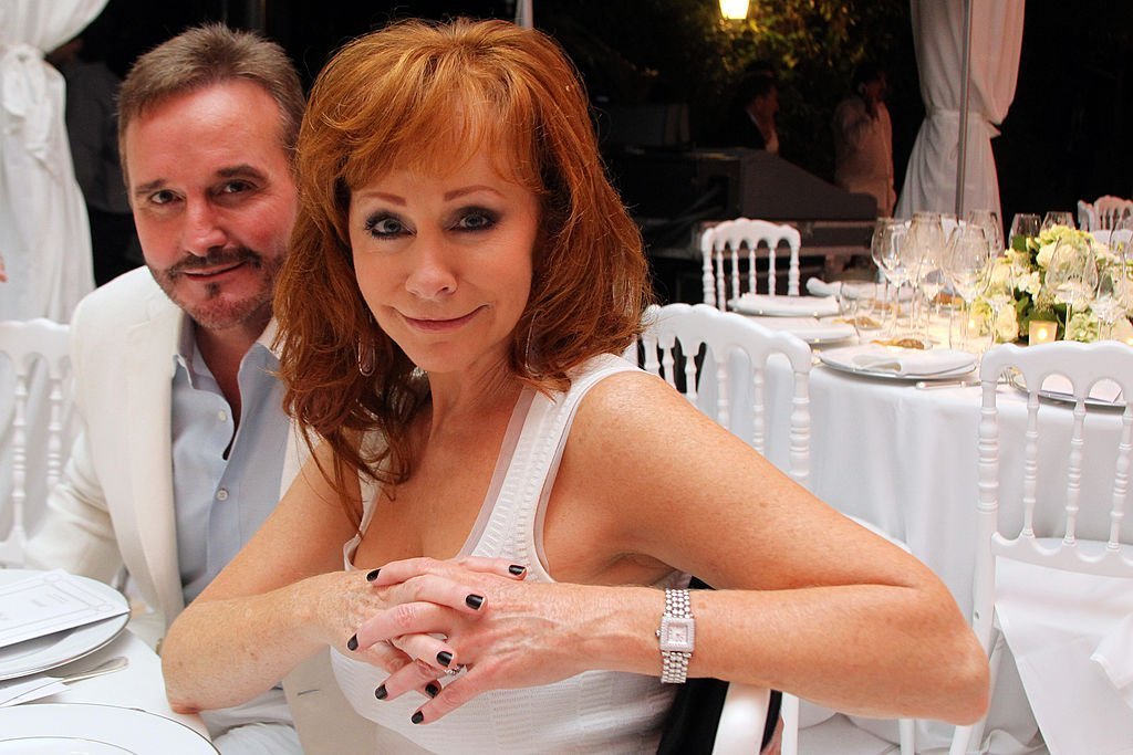 Narvel Blackstock and Reba McEntire attend the White Party Dinner Hosted by Andrea and Veronica Bocelli Celebrating Celebrity Fight Night In Italy Benefitting The Andrea Bocelli Foundation. | Source: Getty Images