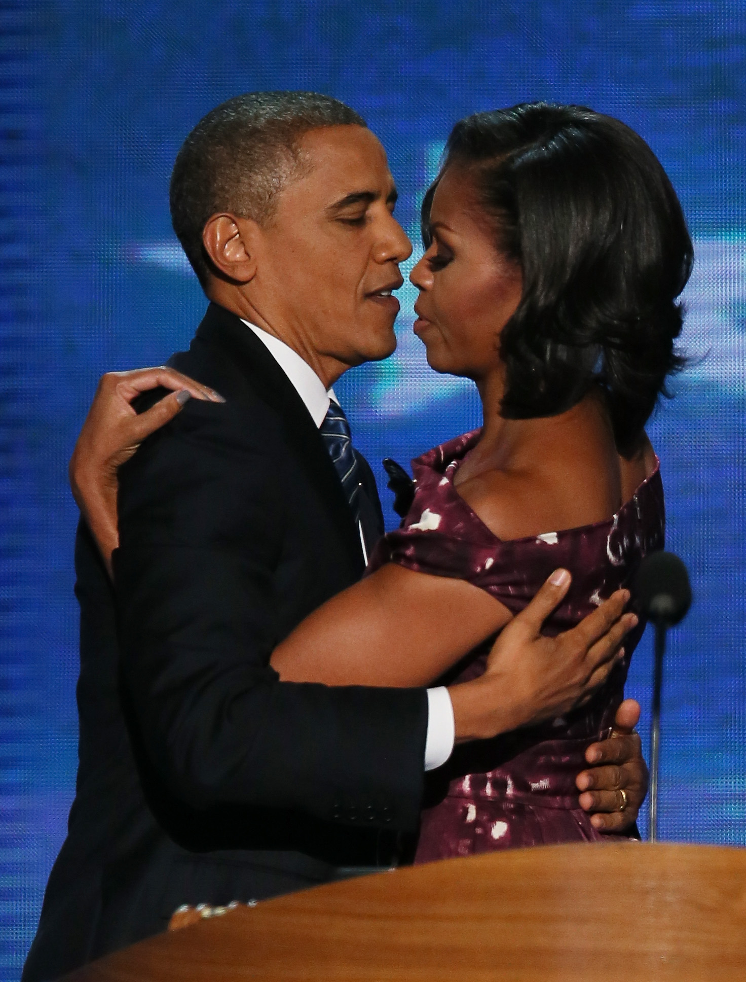 Barack and Michelle Obama sharing a hug during the final day of the Democratic National Convention at Time Warner Cable Arena on September 6, 2012, in Charlotte, North Carolina. | Source: Getty Images
