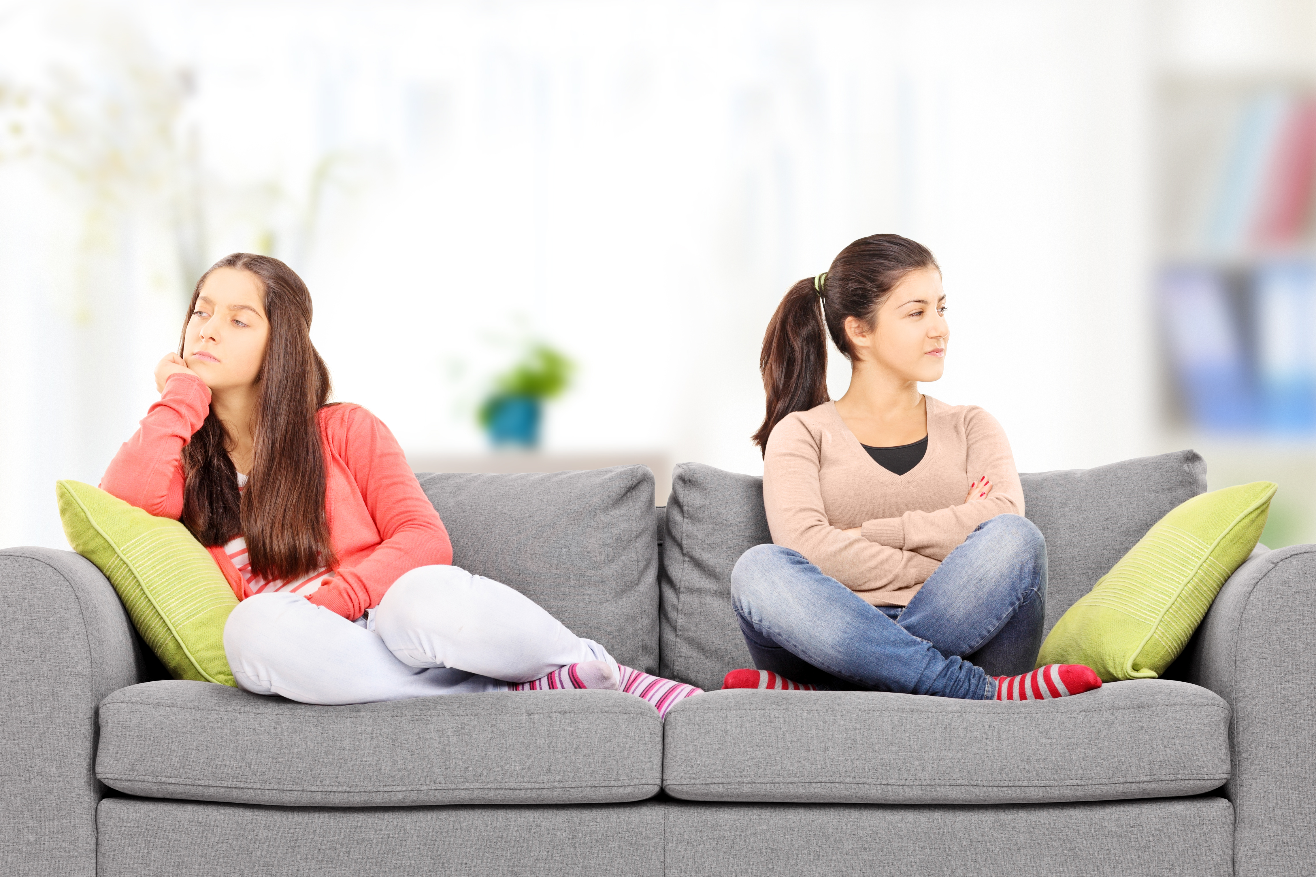 Two girls unhappy with each other | Source: Shutterstock