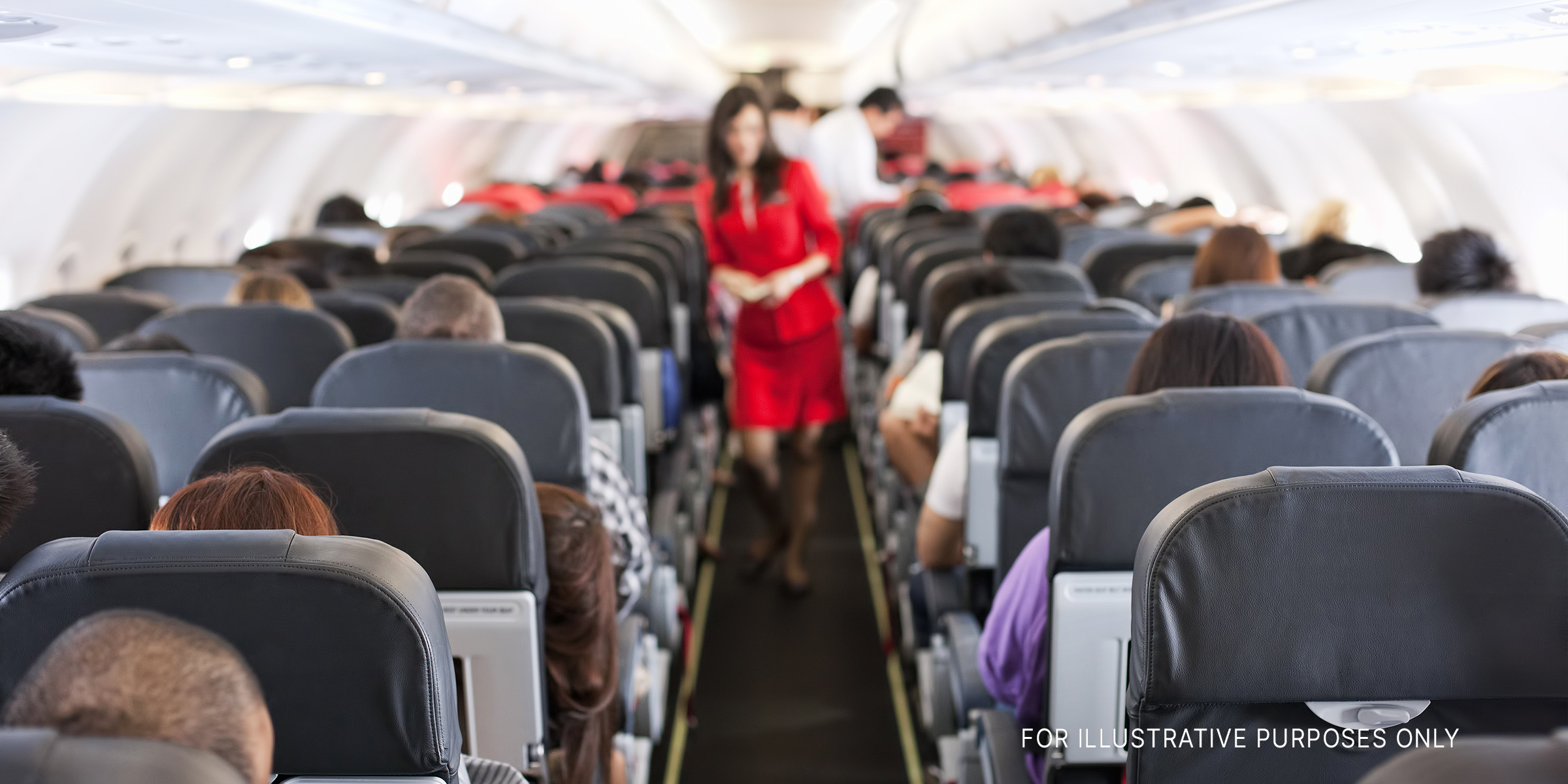 People on a plane | Source: Getty Images