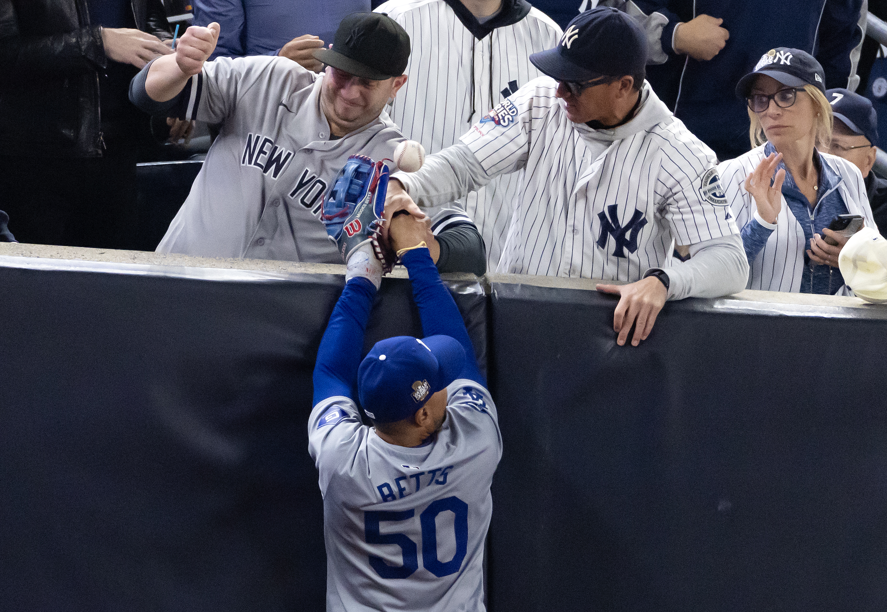 Austin Capobianco, Mookie Betts, and John Peter | Source: Getty Images