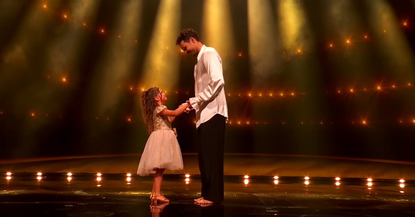 Olivia and Dylan Efron holding hands during Dylan's contemporary performance on "Dedication Night" of "DWTS," posted on October 15, 2025. | Source: YouTube/Dancing With The Stars