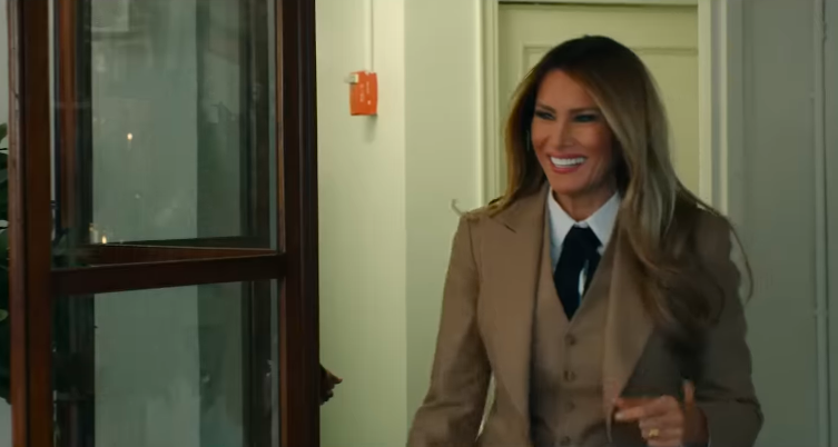 Melania Trump smiling in a scene from her documentary's trailer, posted on December 17, 2025. | Source: YouTube/Amazon MGM Studios