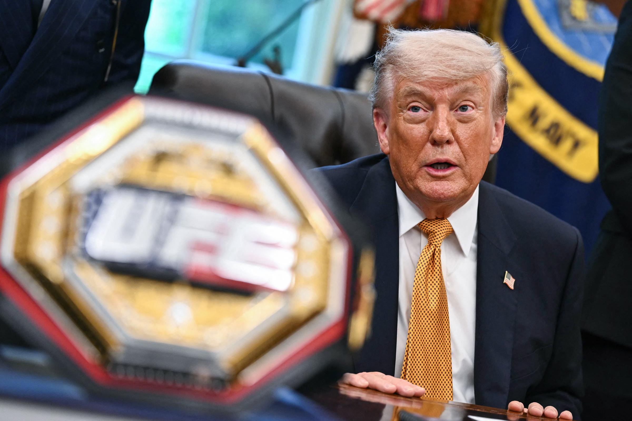A UFC championship belt is displayed as Donald Trump speaks about the upcoming "UFC Freedom 250" event, in the Oval Office of the White House on May 6, 2026, in Washington, DC | Source: Getty Images