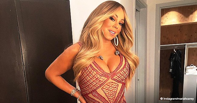 Mariah Carey Flaunts Her Curves in Skin-Tight Red & Nude Mermaid Dress in Recent Photo