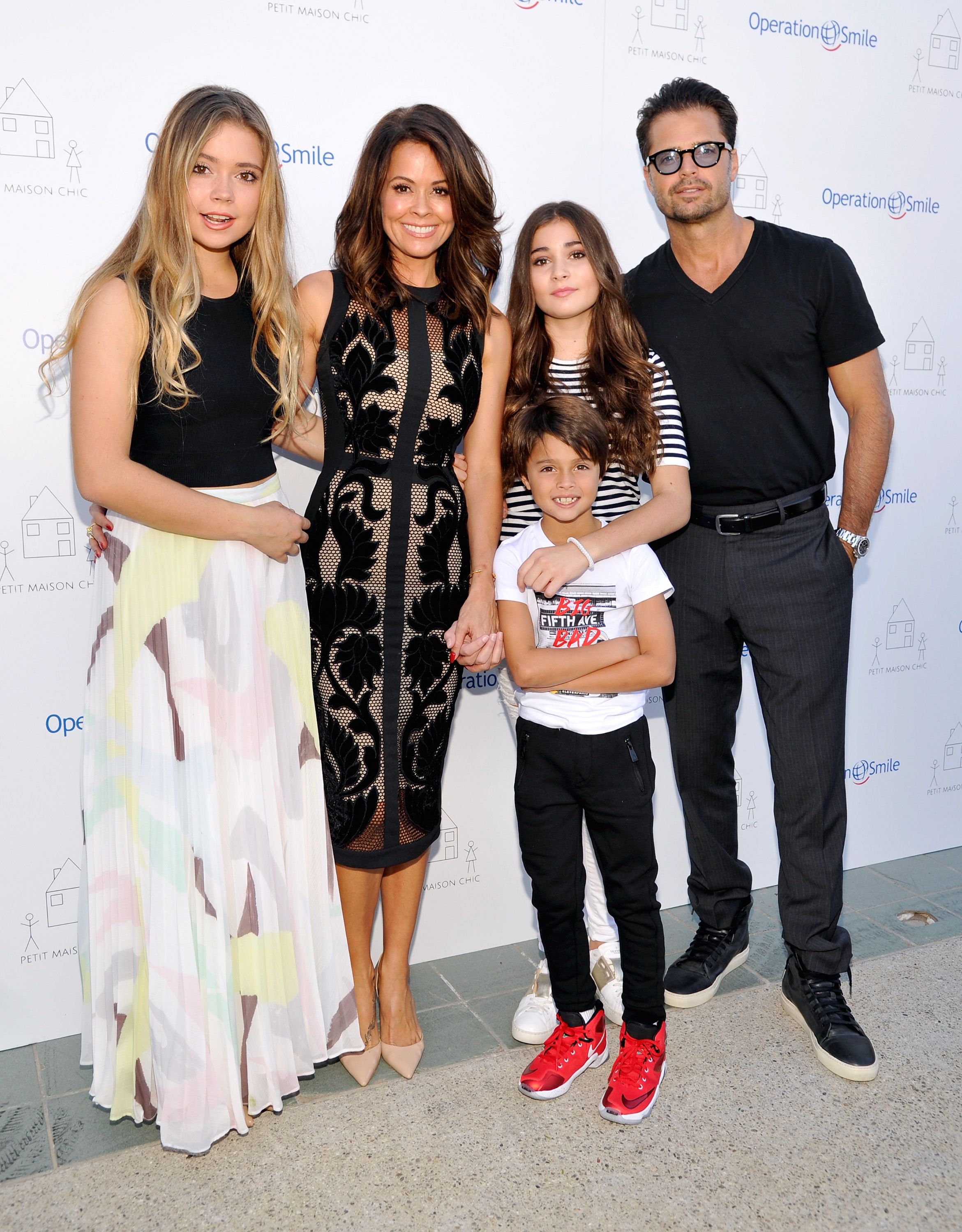 Neriah Fisher, actress Brooke Burke-Charvet, Shaya Charvet, Sierra Fisher and actor David Charvet at the Petit Maison Chic fashion show honoring Operation Smile on November 21, 2015 | Photo: Getty Images