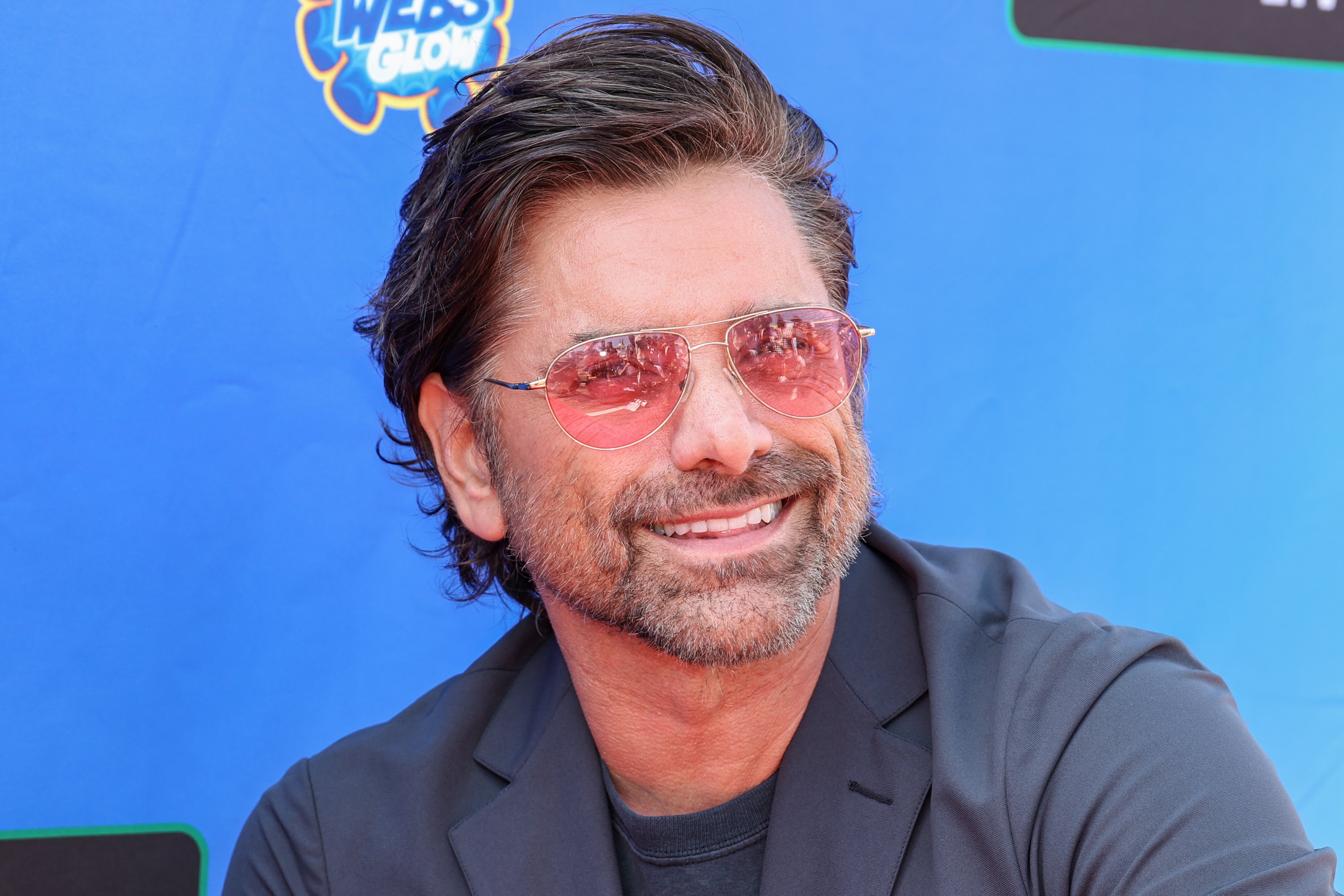 John Stamos at Disney Junior's "Marvel's Spidey and His Amazing Friends" VIP event on August 27, 2022, in Santa Monica, California | Source: Getty Images
