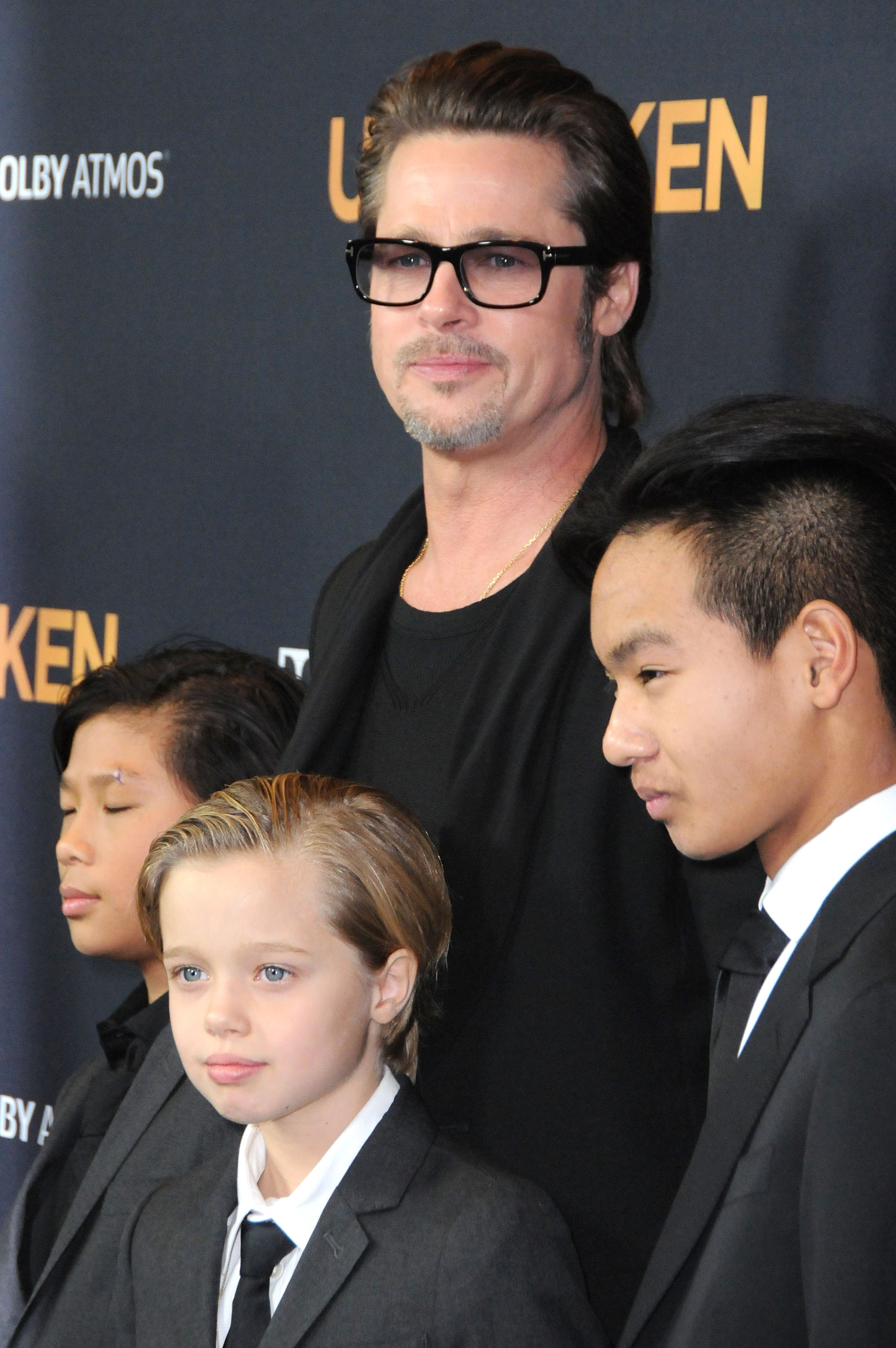 Pax Thien Jolie-Pitt, Shiloh Nouve Jolie-Pitt, Brad Pitt and Maddox Jolie Pitt during the premiere of "Unbroken" at TCL Chinese Theatre IMAX on December 15, 2014, in Hollywood, California. | Source: Getty Images