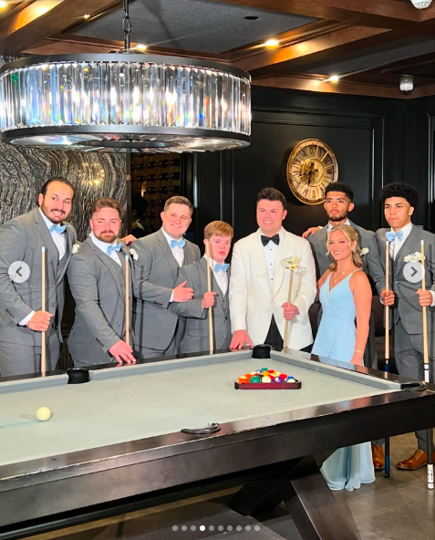 Blake O'Donnell posing for a picture with his best woman and groomsmen, posted on August 18, 2024 | Source: Instagram/theannesteele