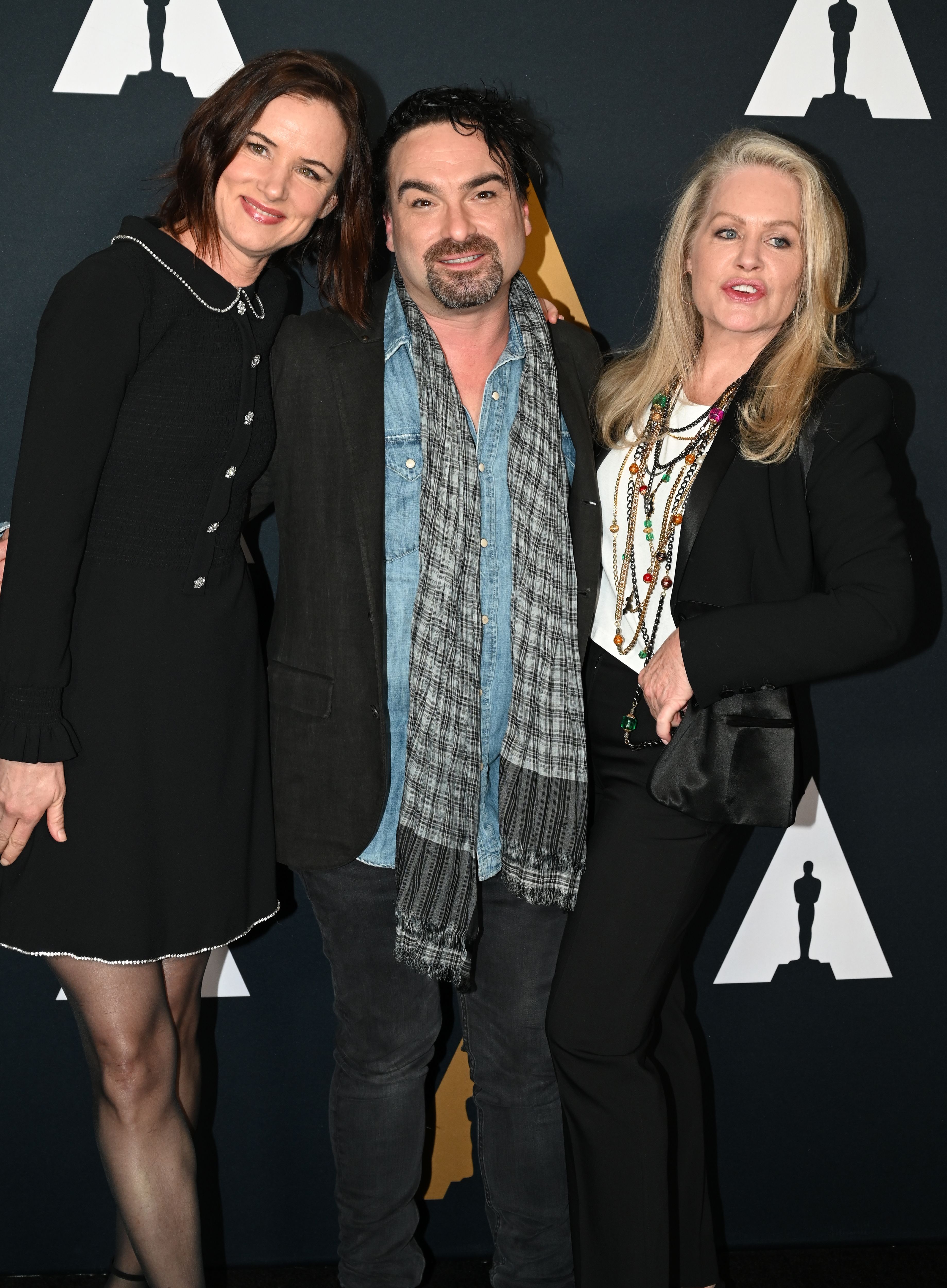 Juliette Lewis, Johnny Galecki, and Beverly D'Angelo attend the Academy of Motion Picture Arts and Sciences 30th-anniversary screening of "National Lampoons Christmas Vacation" in Beverly Hills on December 12, 2019. | Source: Getty Images
