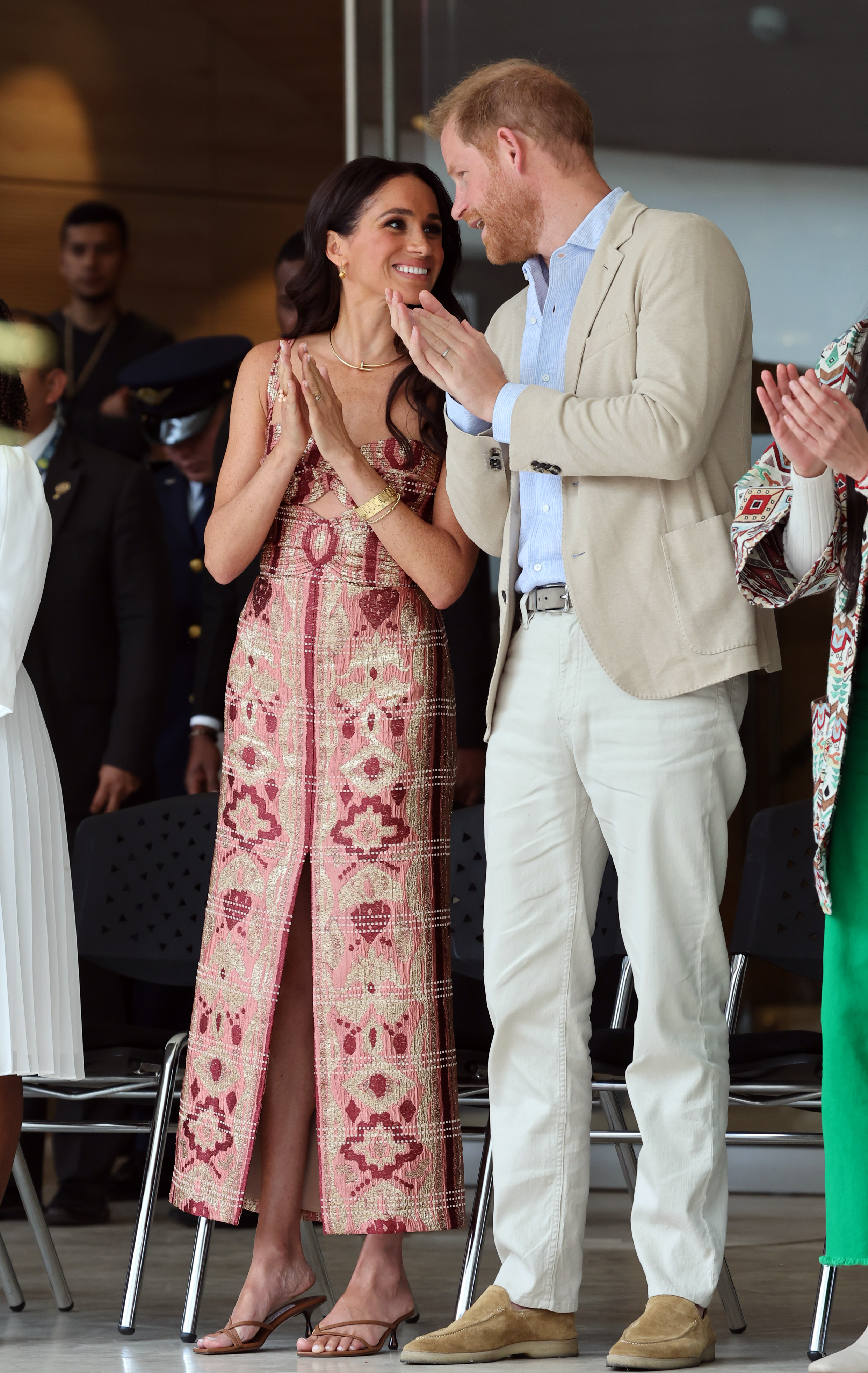 Meghan Markle and Prince Harry applaud at the Centro Nacional de las Artes Delia Zapata in Bogotá on August 15, 2024 | Source: Getty Images