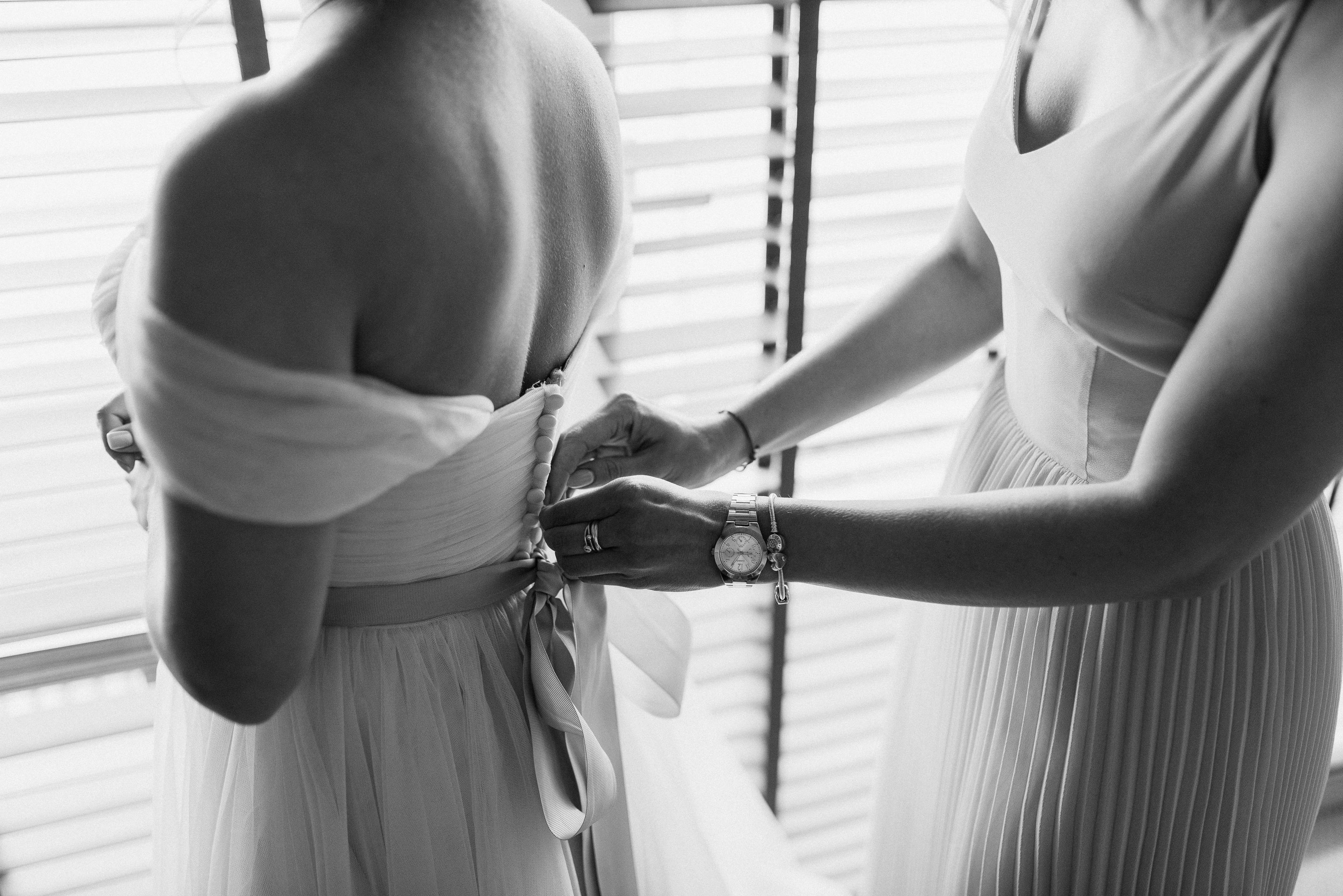 Admiring the fairy-tale elegance of the dresses | Source: Pexels