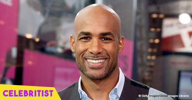 Boris Kodjoe dances with his wife in a sparkling gold dress on 13th wedding anniversary