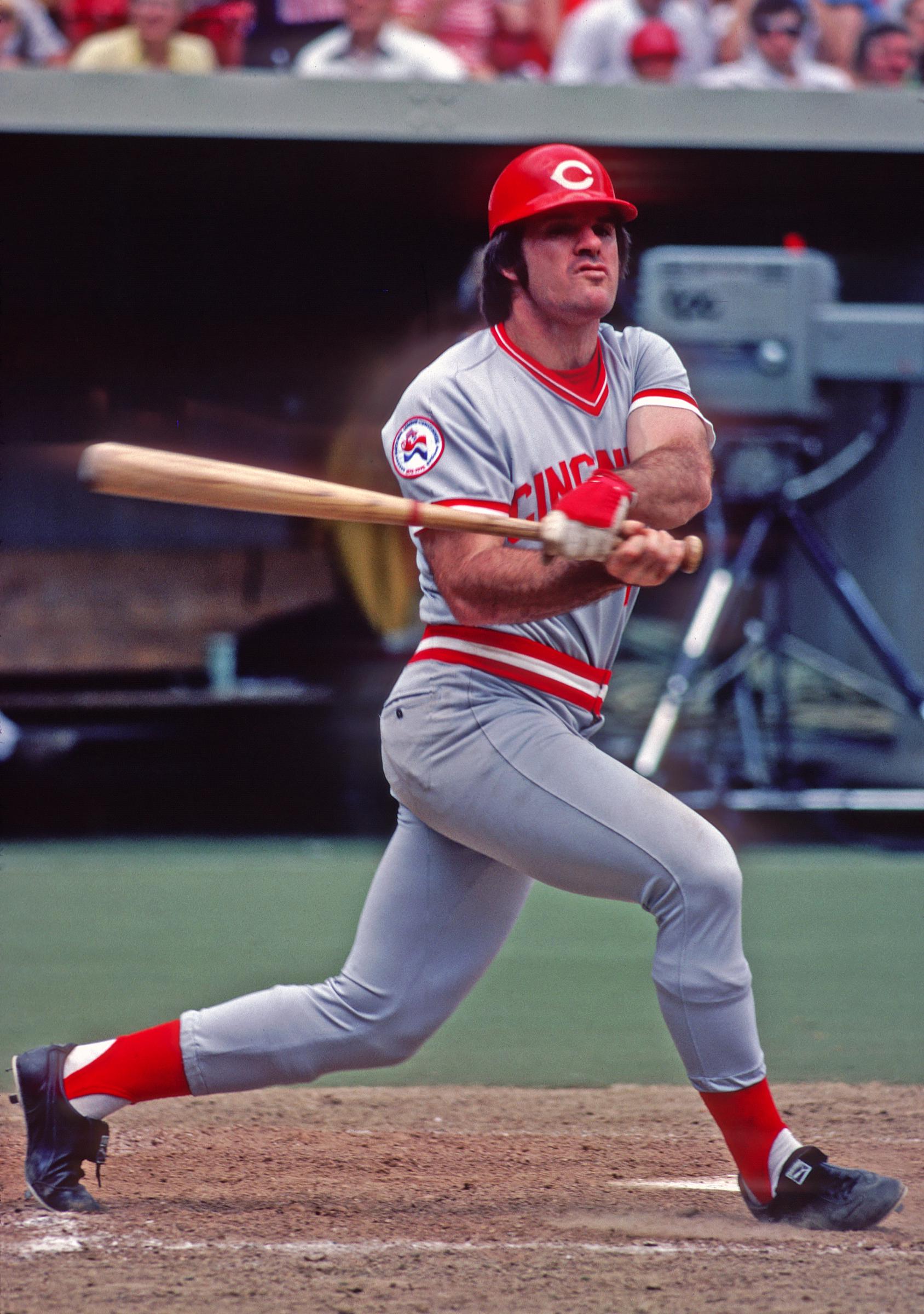 Pete Rose of the Cincinnati Reds bats during a Major League Baseball game against the Pittsburgh Pirates at Three Rivers Stadium in 1977 in Pittsburgh, Pennsylvania | Source: Getty Images