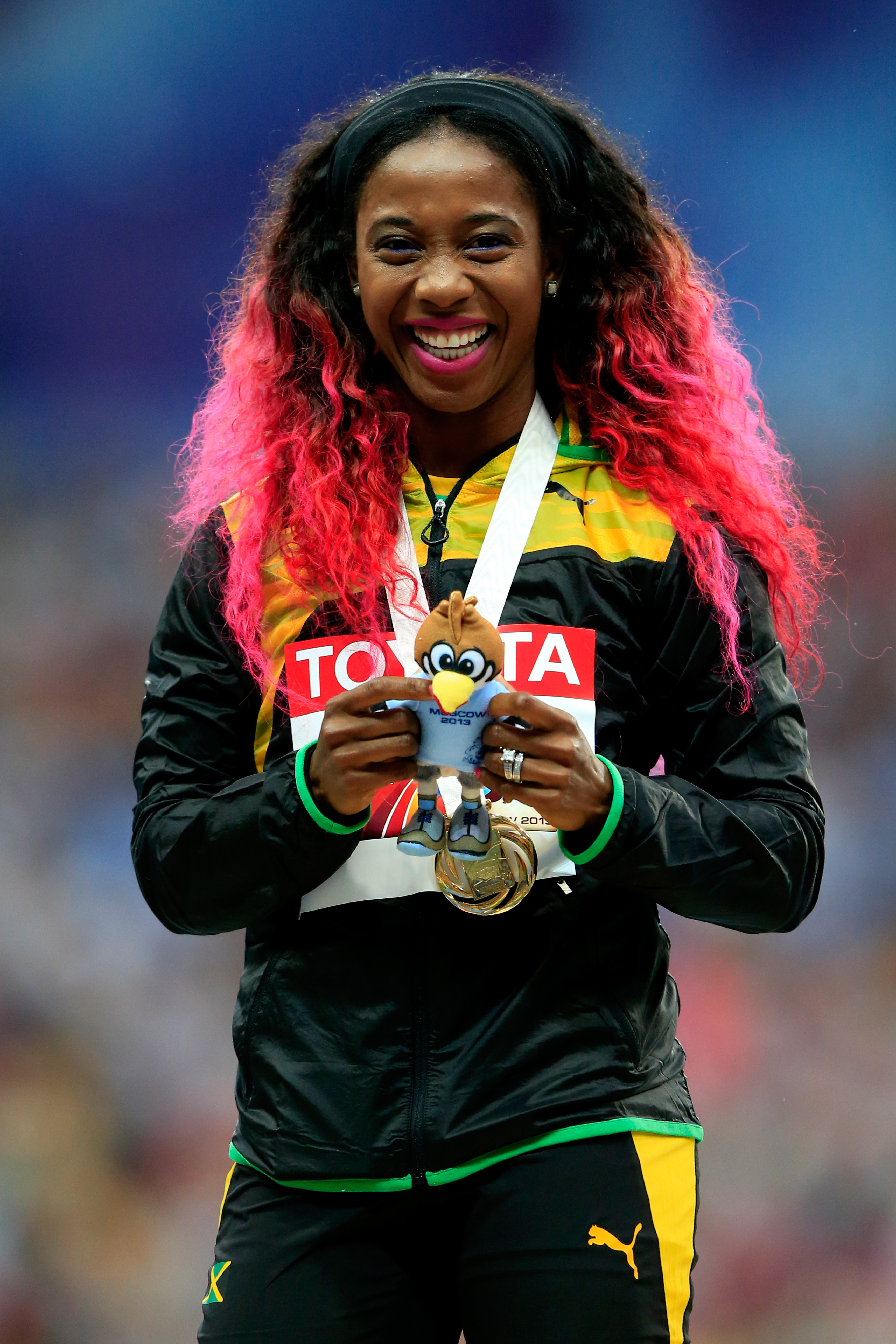 Shelly-Ann Fraser-Pryce during the medal ceremony for the Women's 100m at the 14th IAAF World Athletics Championships Moscow 2013 on August 13, 2013, in Moscow, Russia. | Source: Getty Images