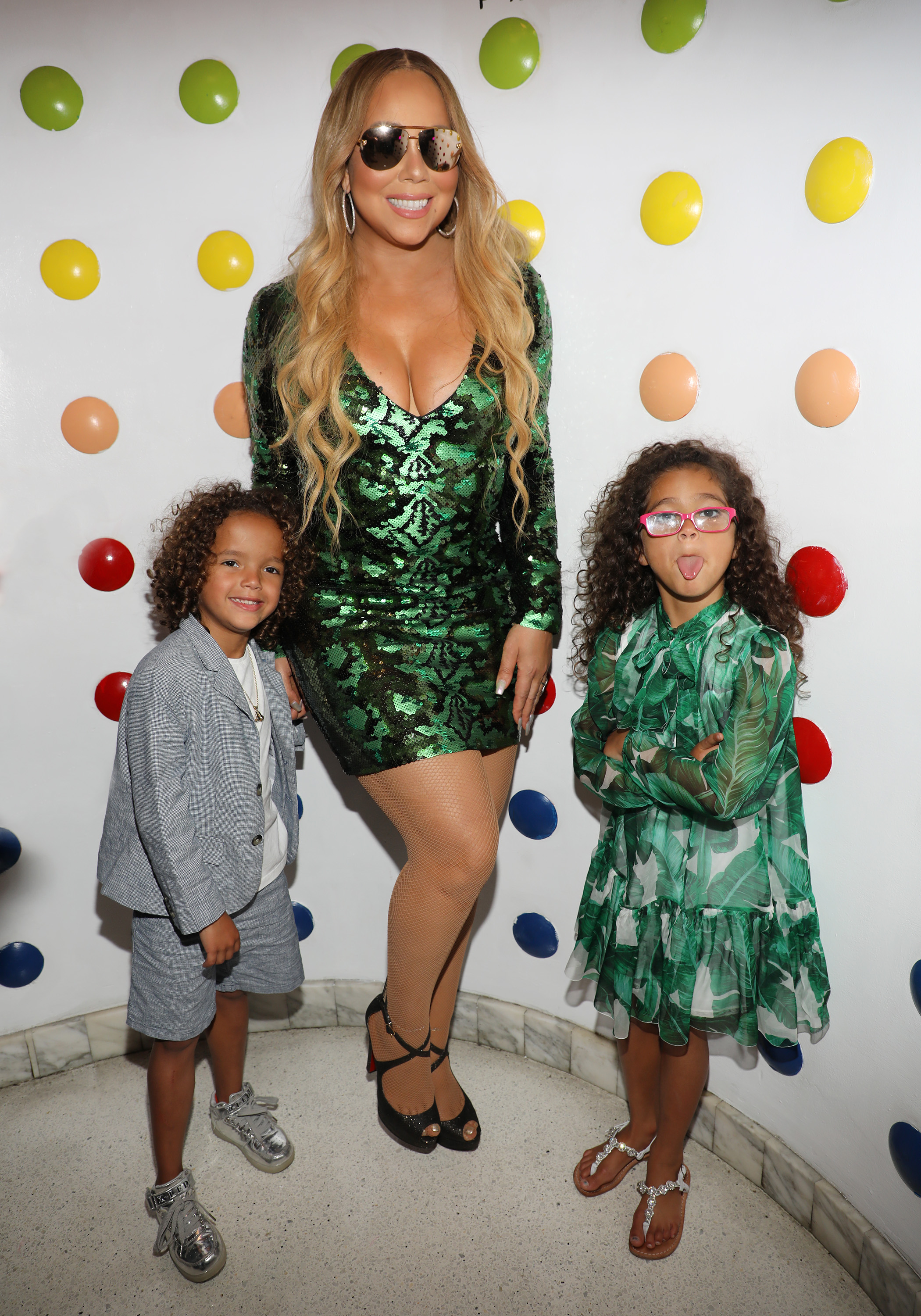 Mariah Carey and her twins, Moroccan Scott Cannon and Monroe Cannon, attend the singer's concert afterparty at Sugar Factory American Brasserie on Ocean Drive on August 10, 2017, in Miami Beach, Florida.