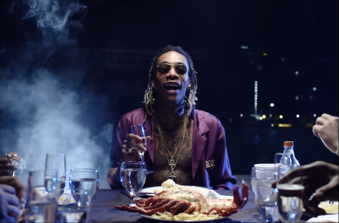 Wiz Khalifa wears sleek tortoiseshell MMM sunglasses in a scene from the "Elevated" music video, released on April 13, 2016. | Source: YouTube/Wiz Khalifa